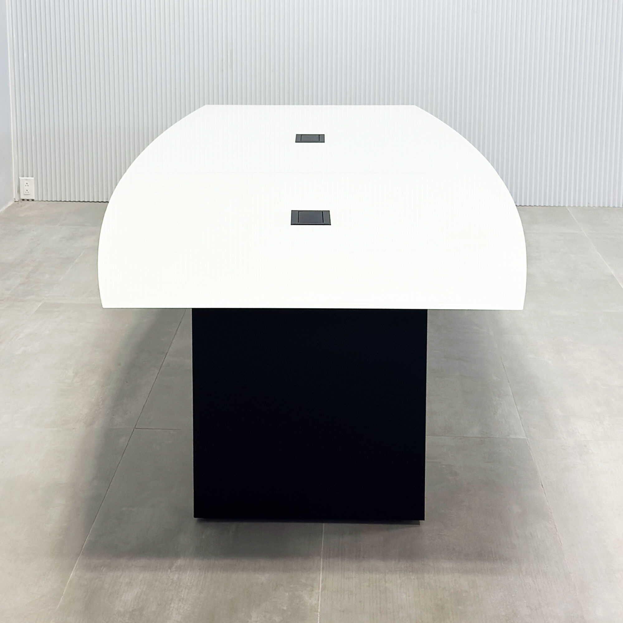 108-inch Omaha Boat Conference Table with white tempered glass top, black matte laminate base, and Mx2 x2 with two power ports, 1 USB-A port, 1 USB-C port black.