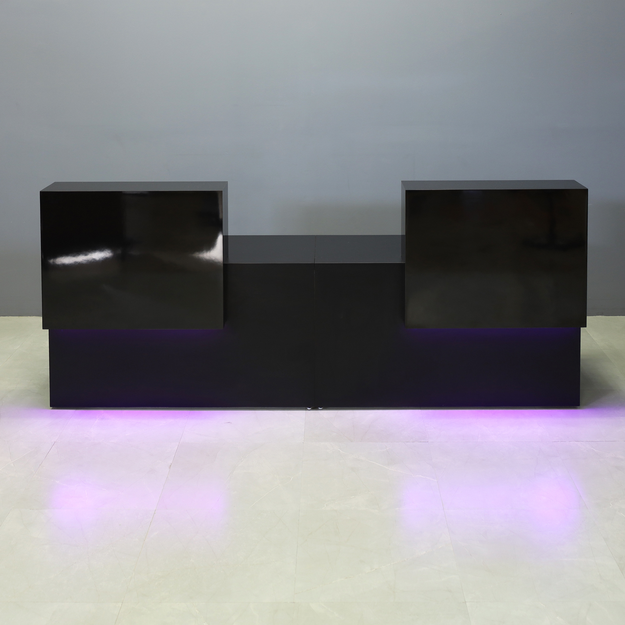108-inch Los Angeles Double Counter Custom Reception Desk in black gloss laminate counters and black matte laminate desks, with color LED, shown here.