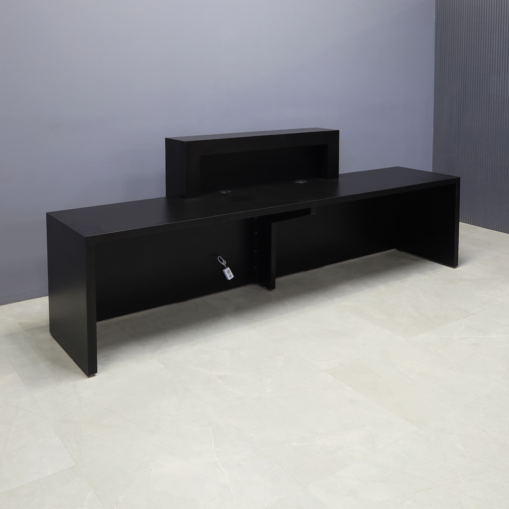 108-inch New York Extra Wide in black matte laminate main desk and recess accent, with multi-colored LED, shown here.