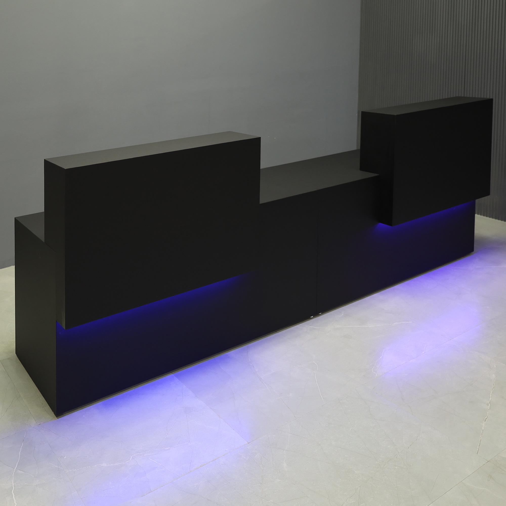 108-inch Los Angeles Double Counter Custom Reception Desk in black traceless laminate counters and desks, with color LED, shown here.