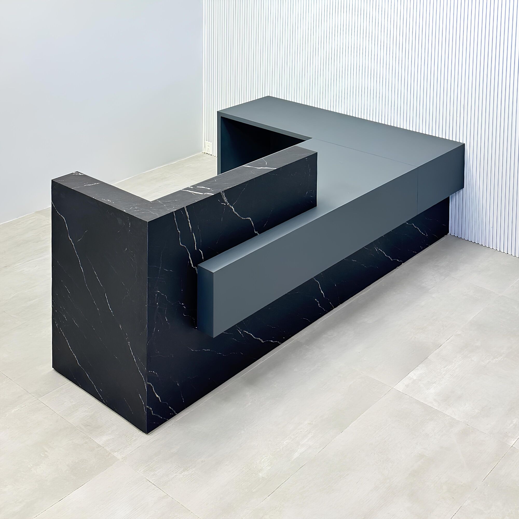 108-inch Atlanta L Reception desk with gray traceless laminate desk, base, and return. Counter top and front accent in black stone palazzo.