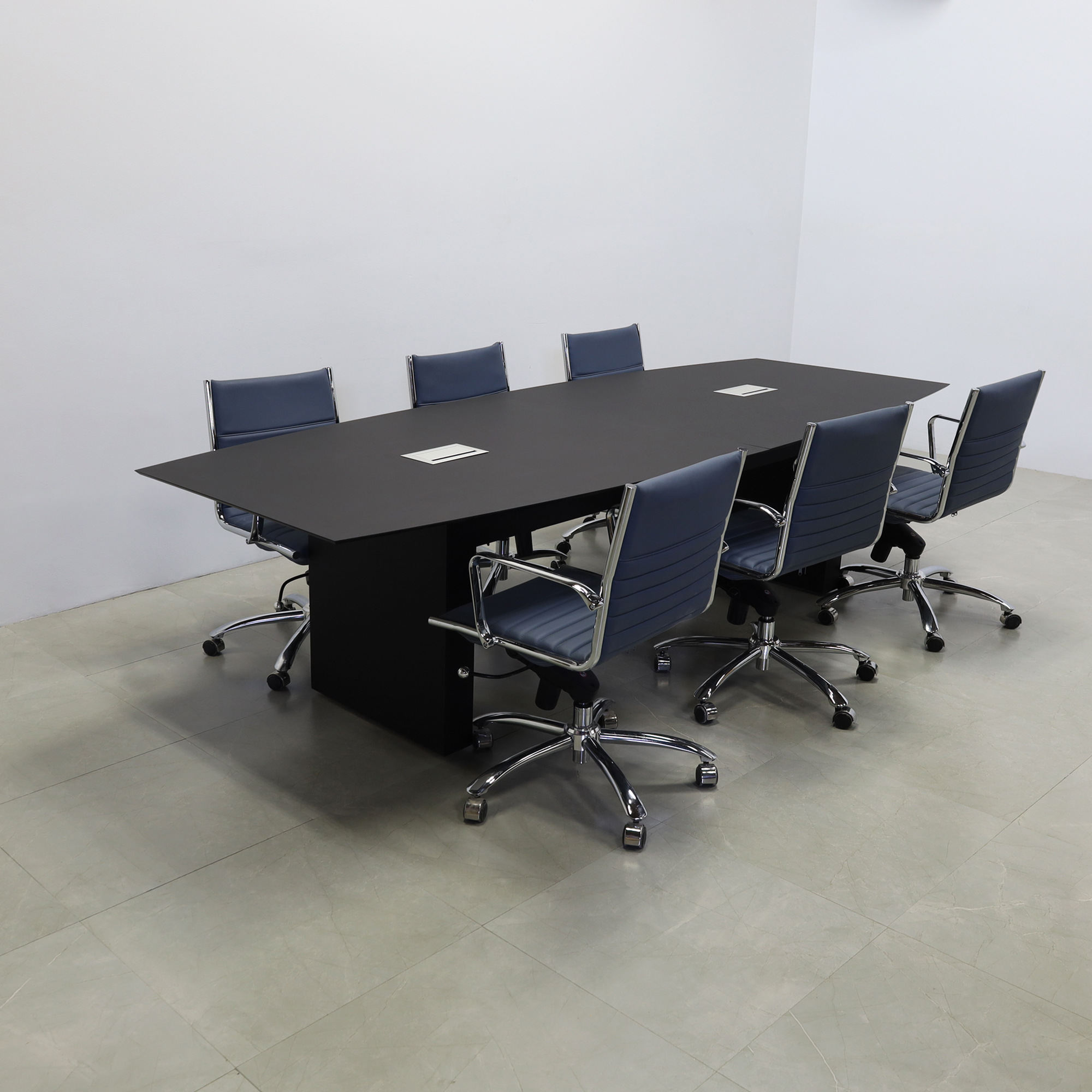 114-inch Aurora Boat Shape Conference Table in 1/2-inch black traceless engineered surface top, standard base black matte laminate, and two silver MX3 power boxes.