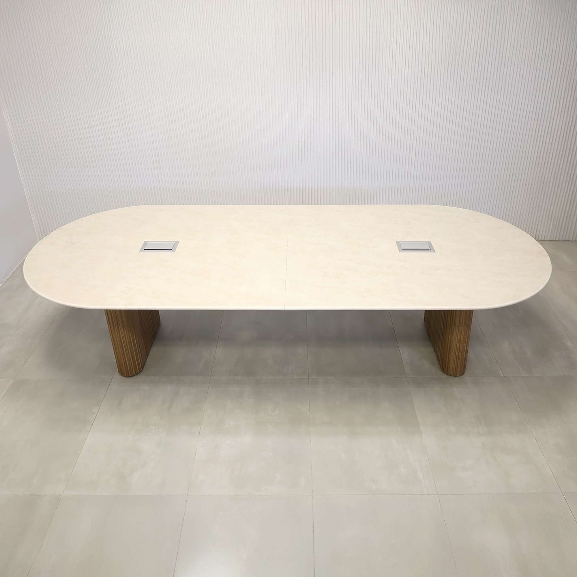 120-inch Aurora Racetrack Conference Table with 3/4" Quartz Taj Mahal Light engineered surface top, Spiced Walnut & Natural Background Tambour leg, Spiced Wood Veneer bridge, and two Mx3 in Silver.