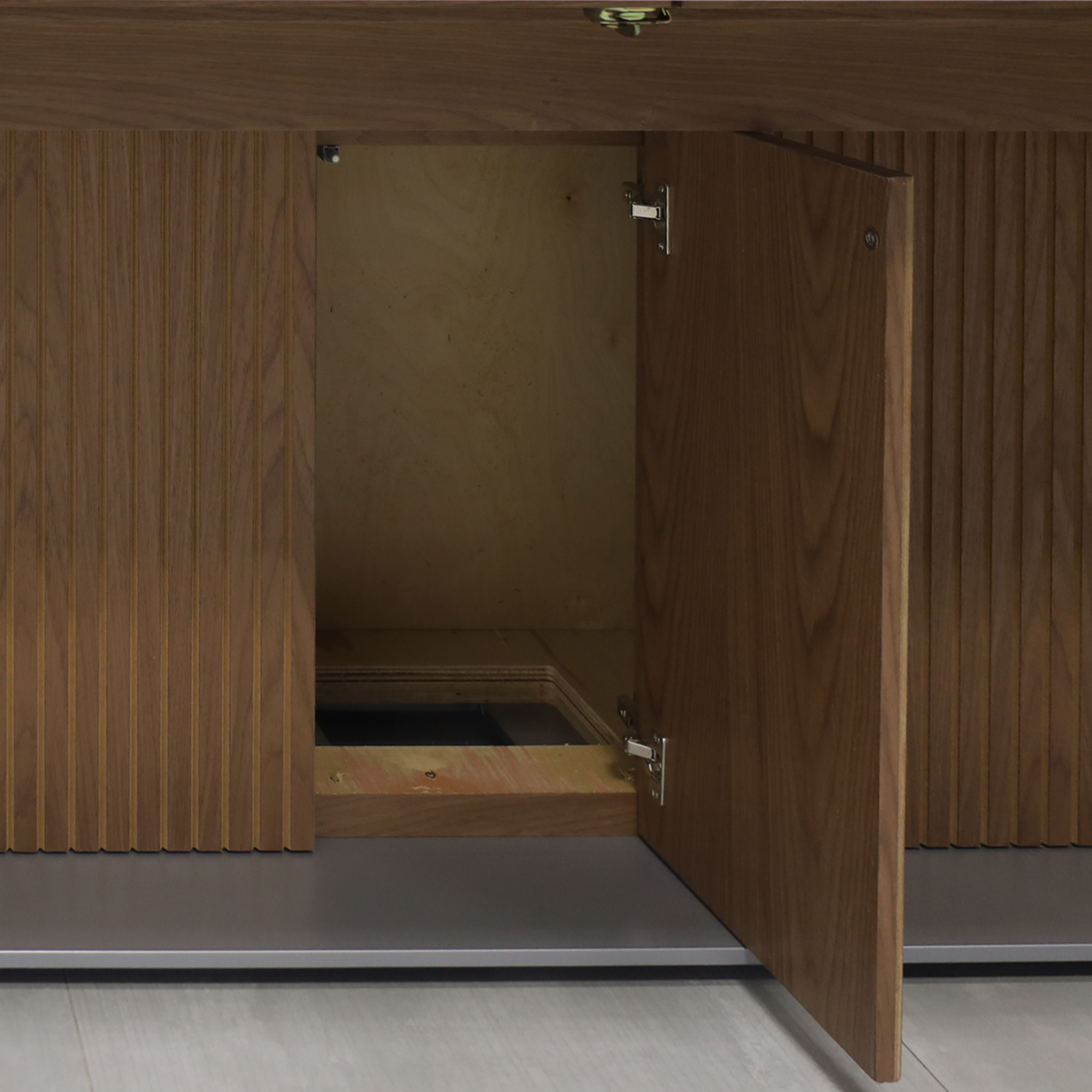 120-inch Aurora Rectangular Conference Table X3 with 1/2" Alicante engineered surface Top, Walnut & natural tambour pedestal, metal powder coated silver base, and two silver Mx3 power boxes.