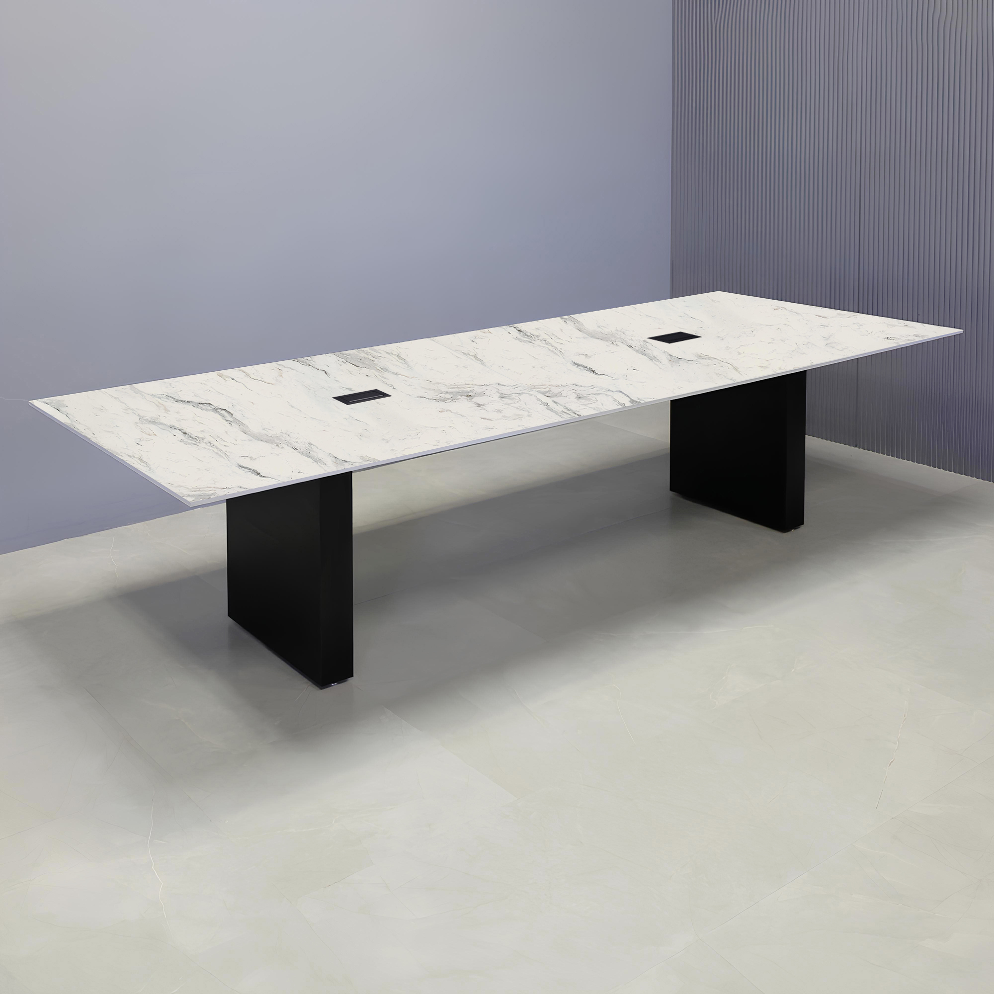 144 in x 48in rectangular table with Calcutta Blanc top, black matte base and black MX-2 power boxes