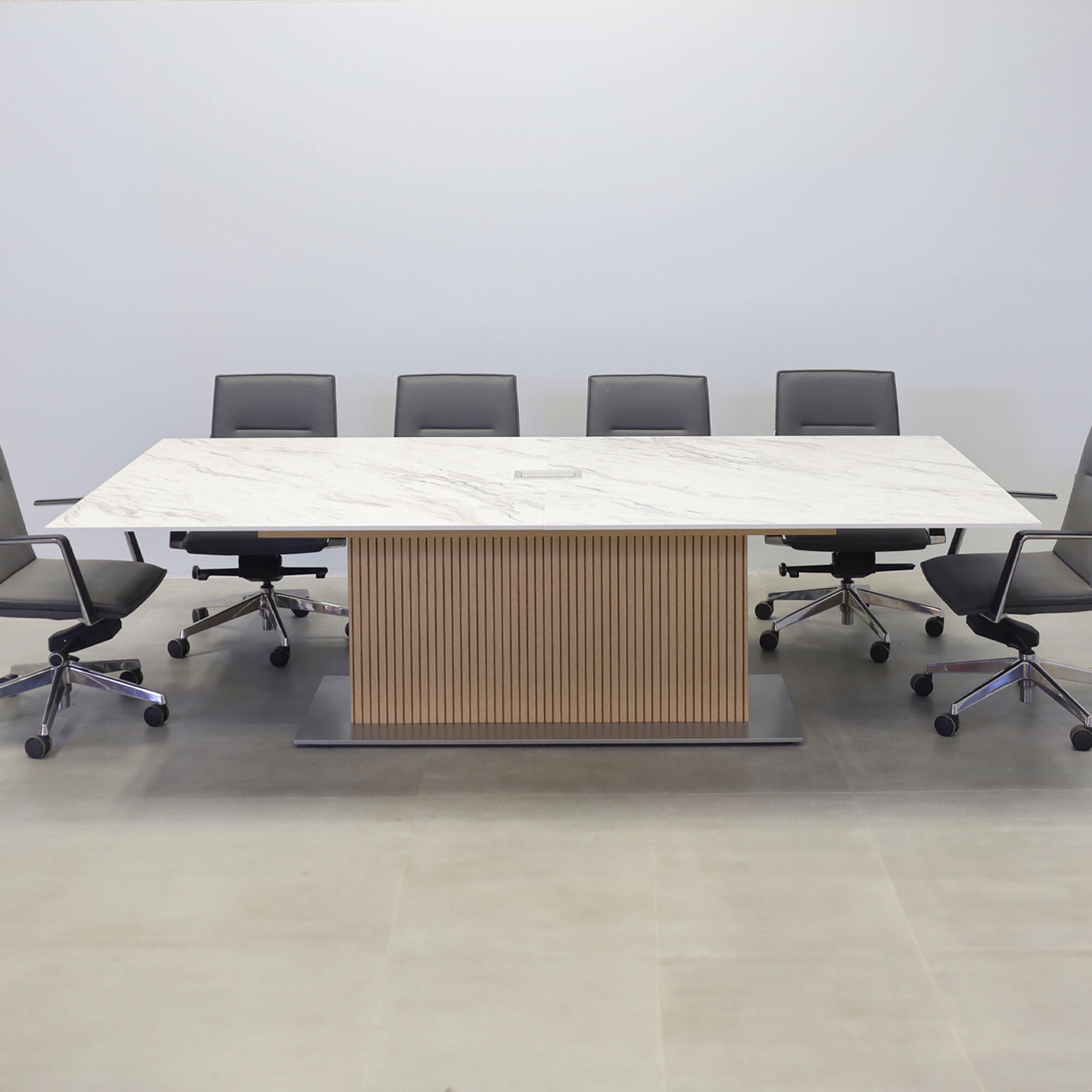 120-inch Aurora Rectangular Conference Table with calcutta engineered surface top, white oak tambour pedestal, and  X3 silver metal powder-coated base.
