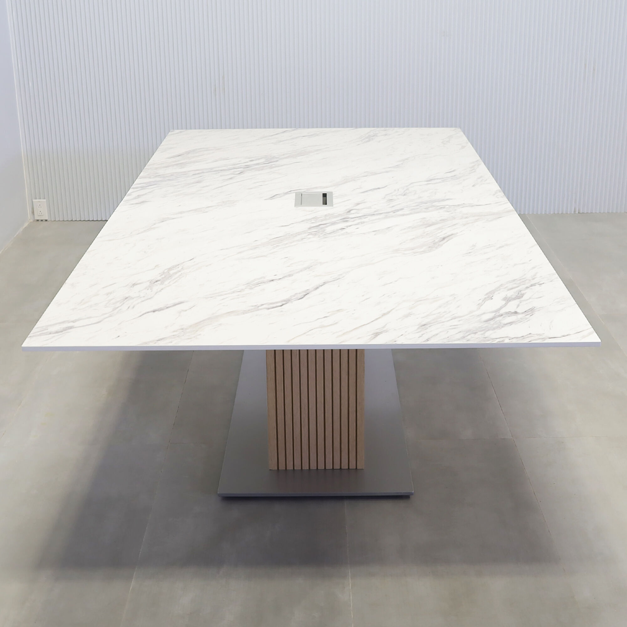 120-inch Aurora Rectangular Conference Table with calcutta engineered surface top, white oak tambour pedestal, and  X3 silver metal powder-coated base.