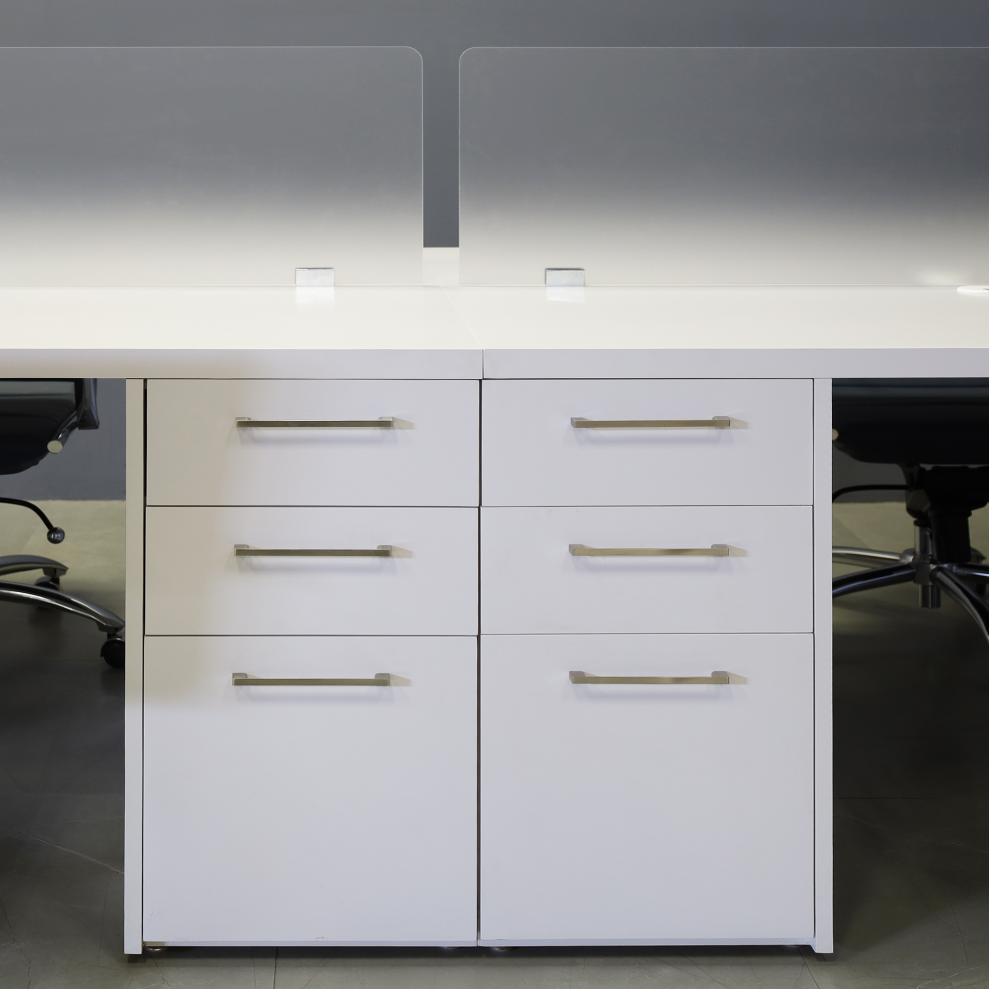 120-inch aXis Workstation in white gloss laminate top, legs and storages, and two frosted acrylics partitions shown here.