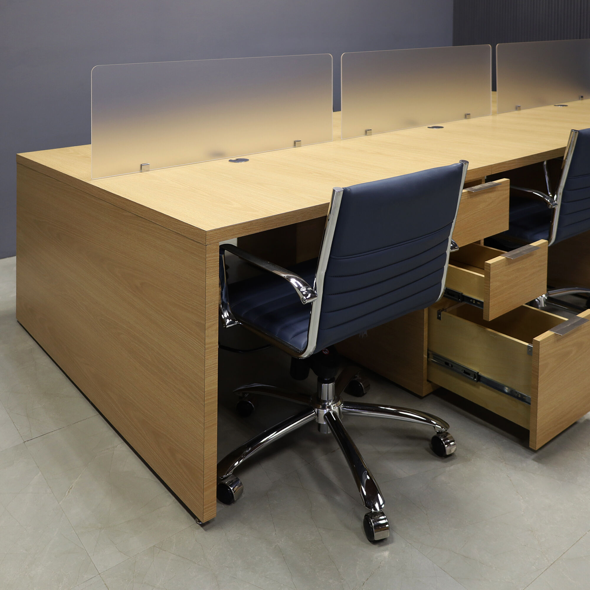 132-inches aXis Custom Workstation in special custom laminate top, legs & storage, with three frosted acrylic partitions.
