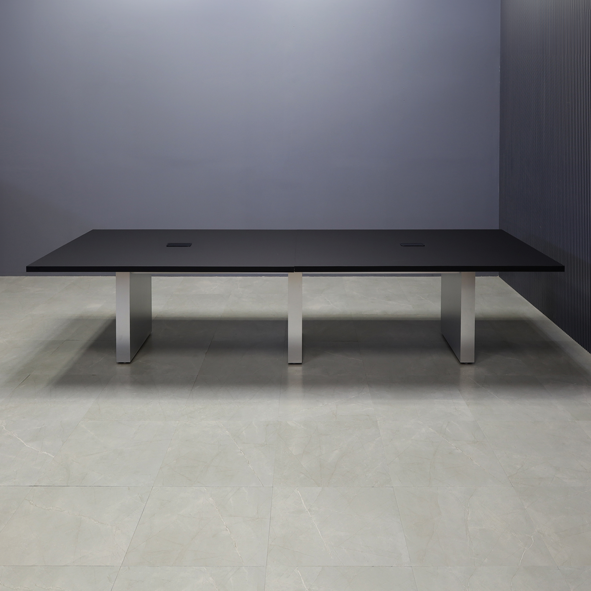 144-inch Newton Rectangular Conference Table in black traceless laminate top and brushed aluminum laminate standard base, with two black powerboxes, shown here.