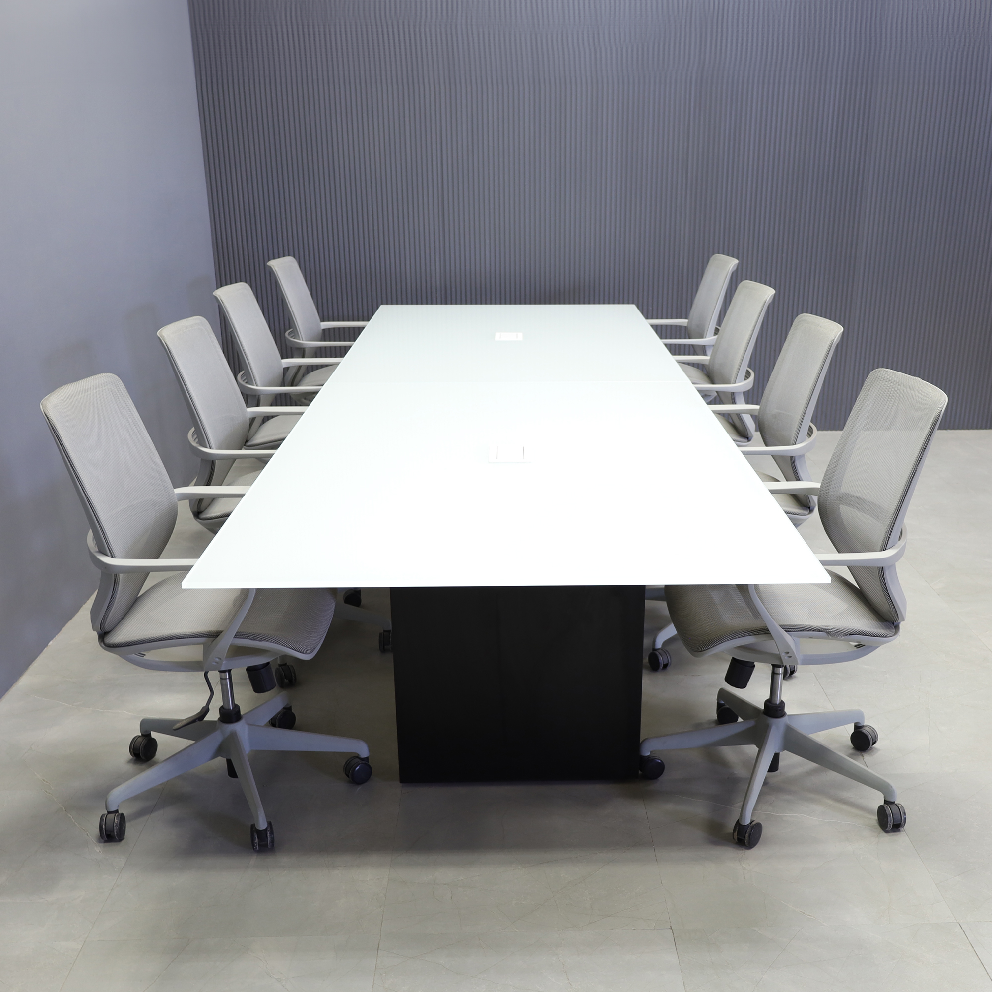 144-inch Omaha Rectangular Conference Table with white glass top, black matte laminate base, and 2 MX2 power boxes in white.