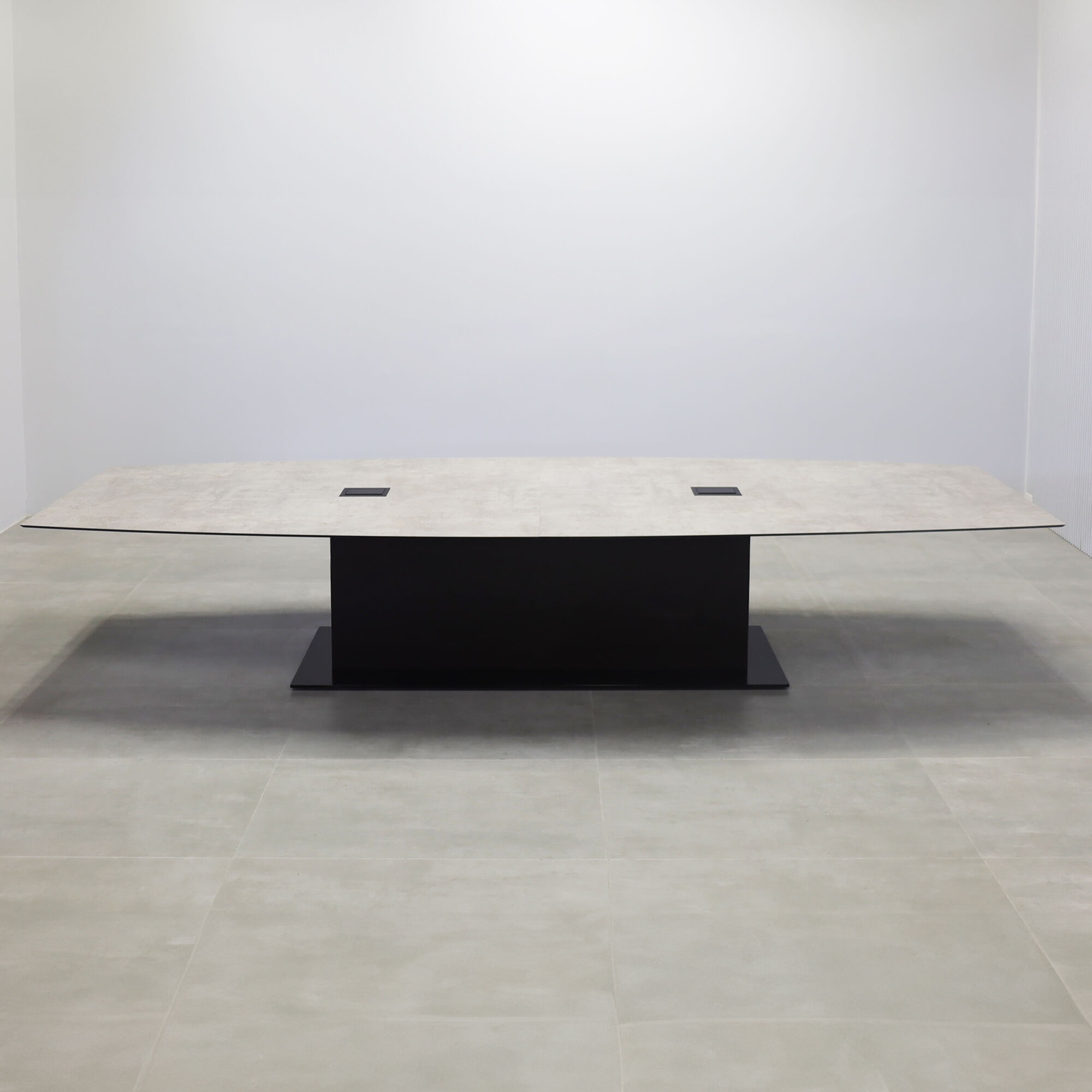 168-inches Newton Boat Shape Conference Table with industrial concrete engineered surface top, white gloss laminate pedestal, white metal base, and 2 Mx2 power boxes.