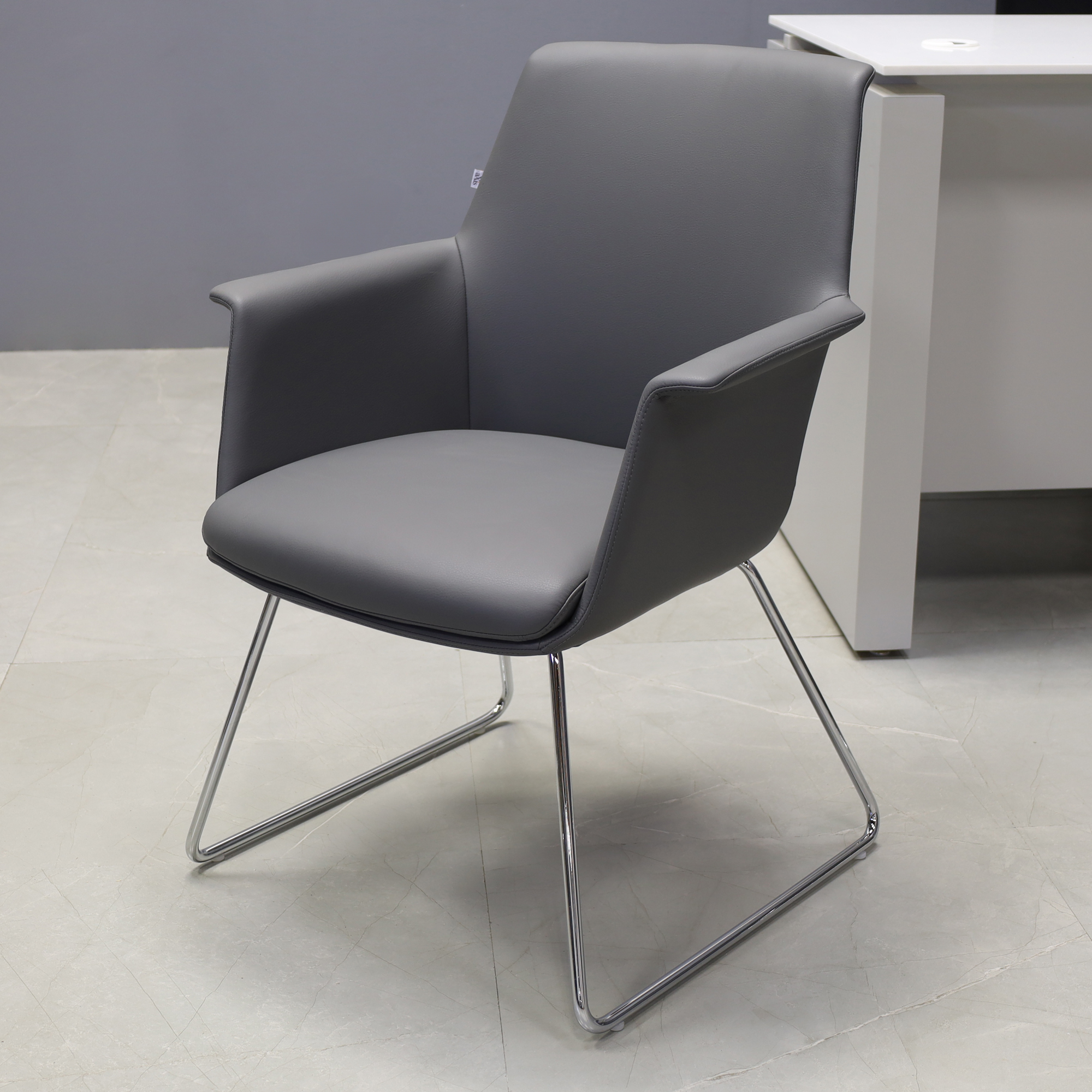 Archi Guest Chair in gray upholstery, shown here.