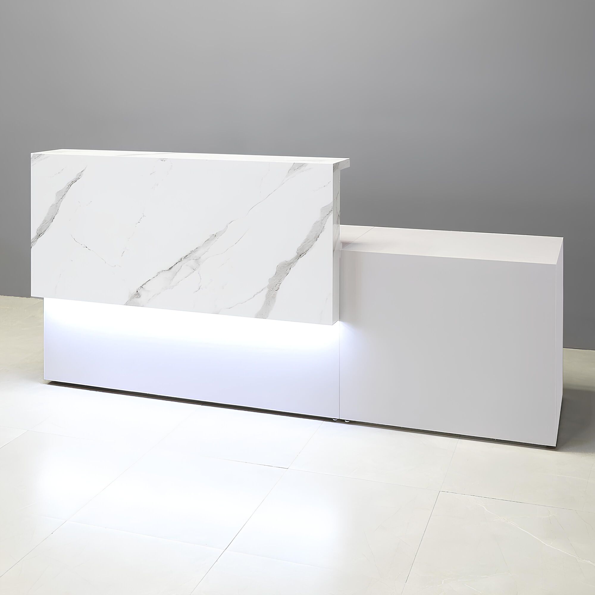 96-inch Los Angeles Long and ADA Compliant Custom Reception Desk with the counter on the left side when facing front in calcutta stone PVC, white gloss laminate desk, and warm white LED.