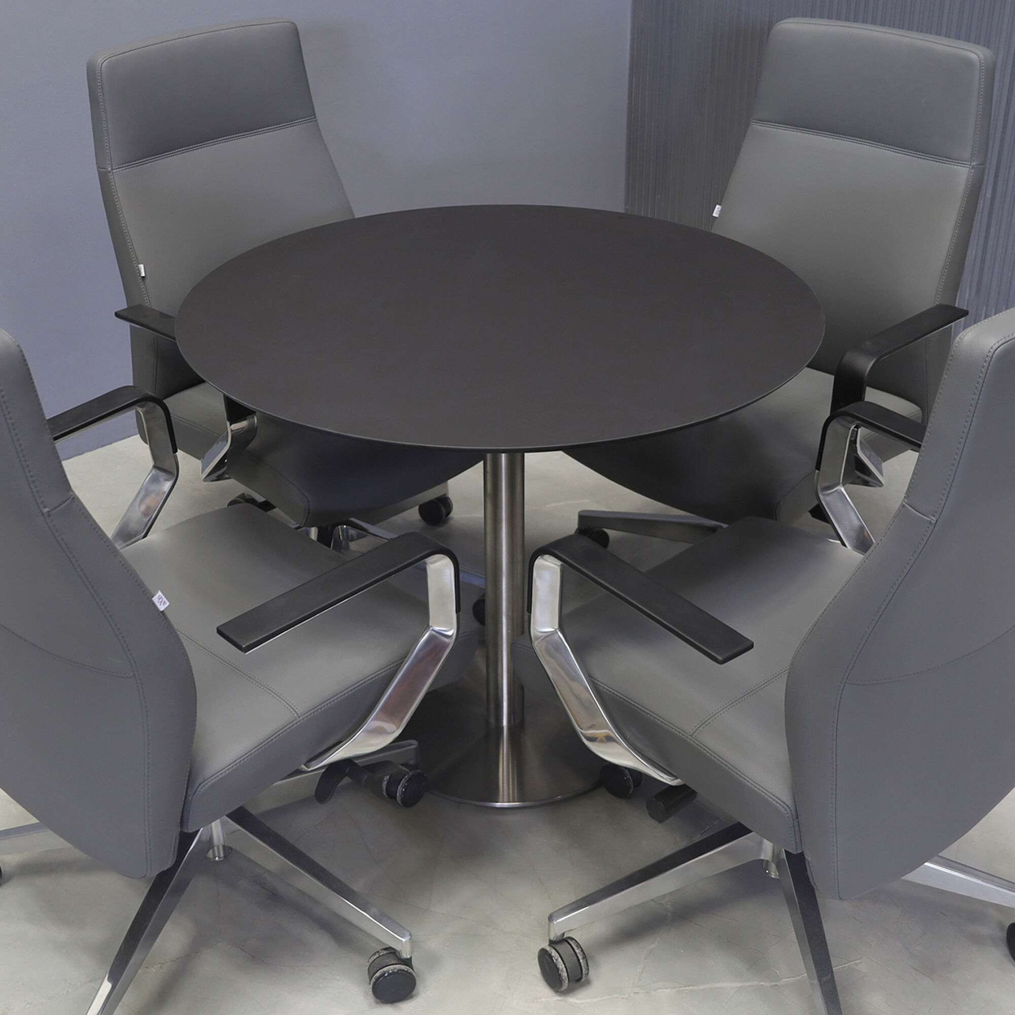 36-inch California Round Cafeteria Table in 1/2-inch black traceless engineered surface top and stainless steel base.