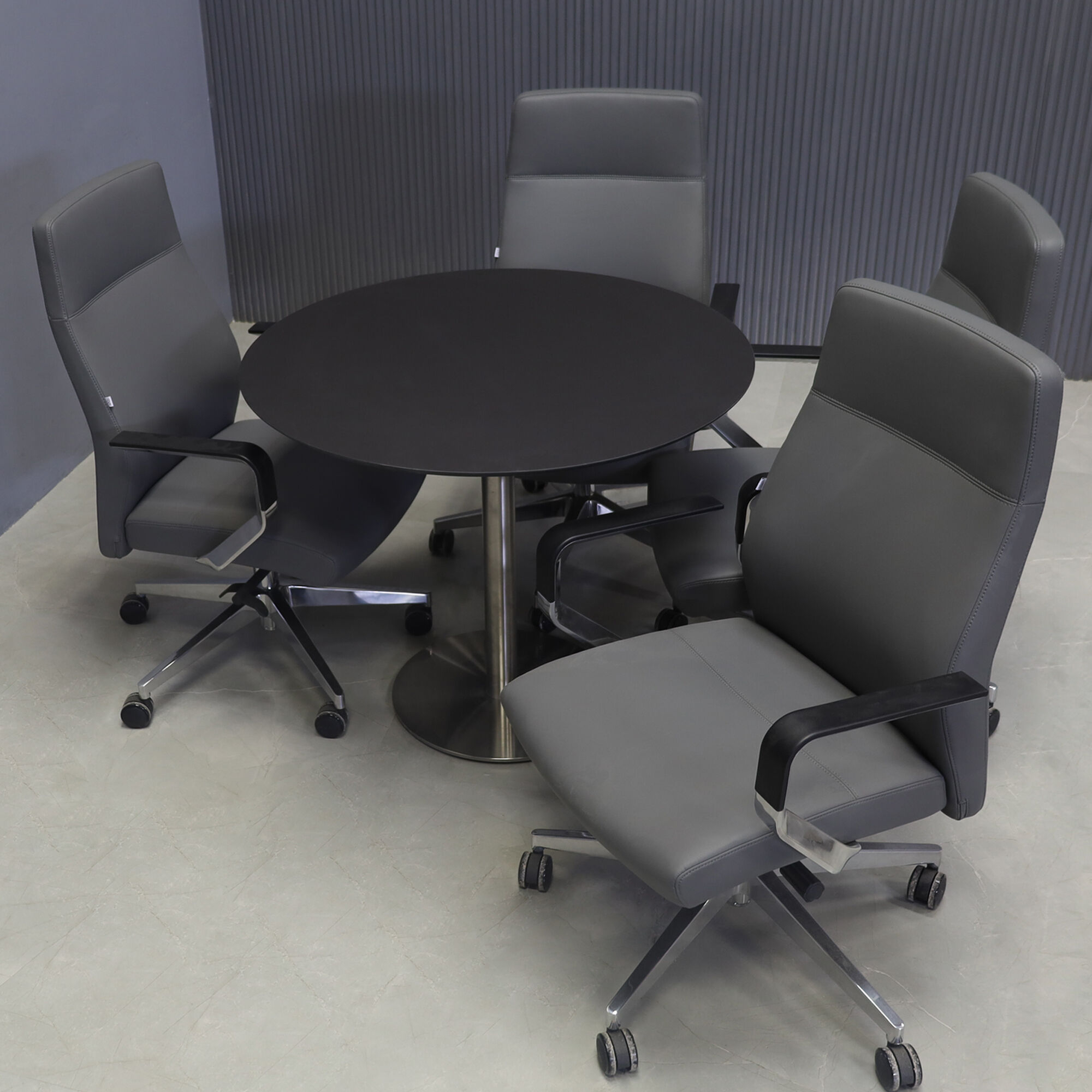 36-inch California Round Cafeteria Table in 1/2-inch black traceless engineered surface top and stainless steel base.
