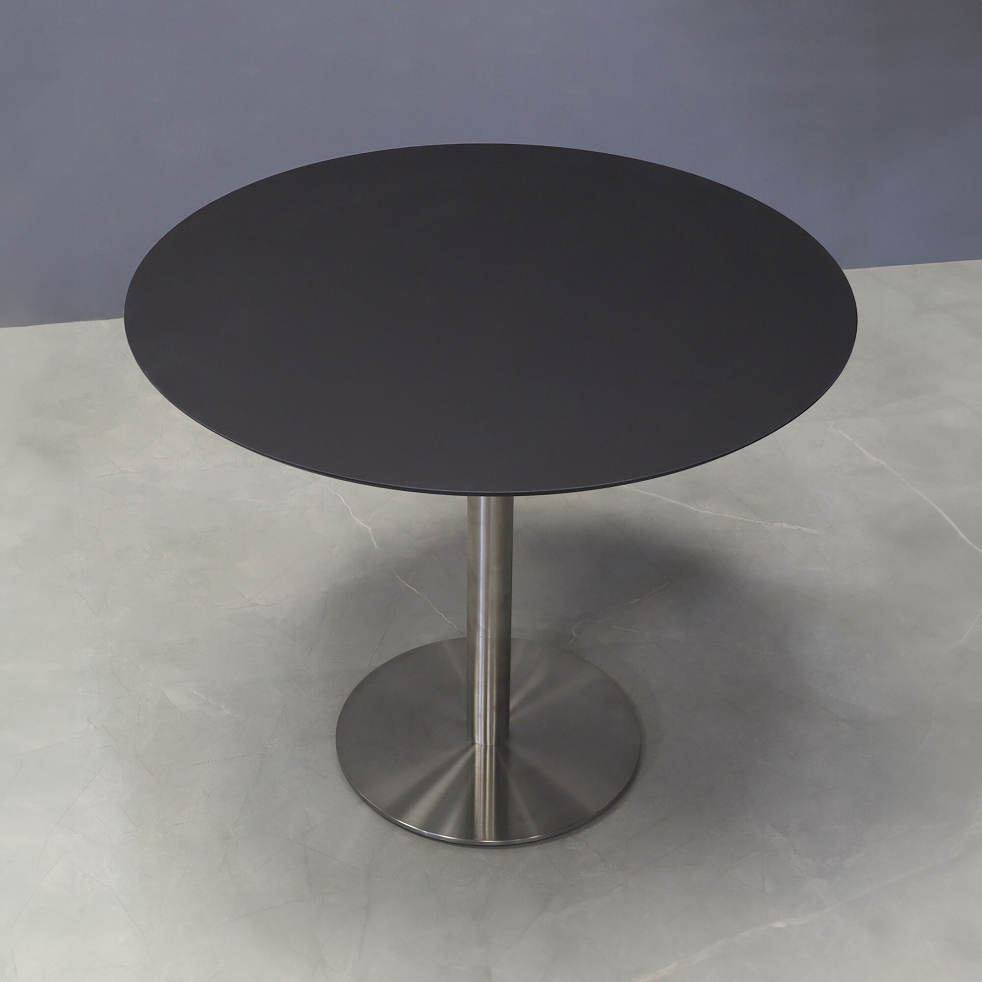 36-inch California Round Cafeteria Table in 1/2-inch black traceless engineered surface top and stainless steel base.