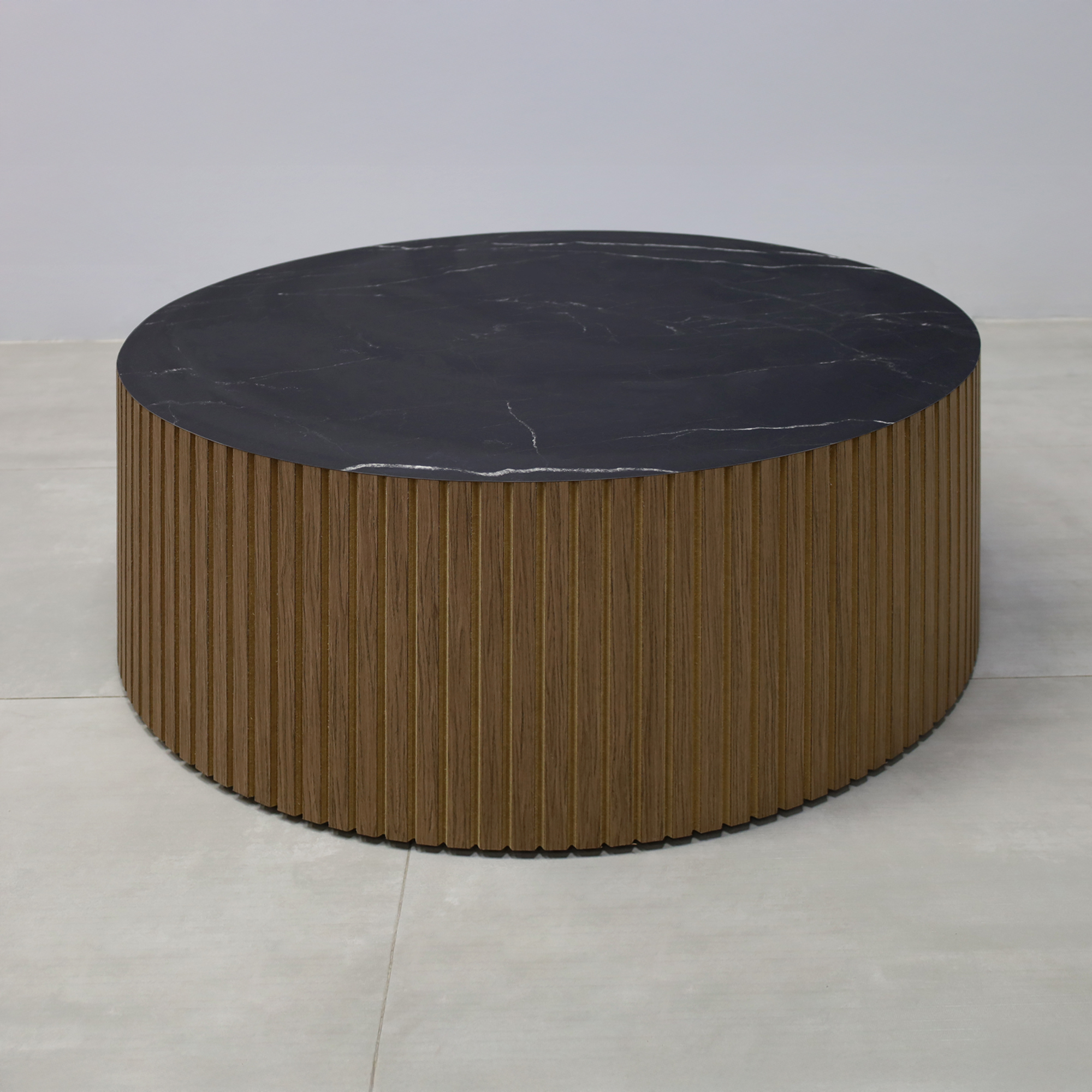 36-inch Norfolk Custom Round Lobby Table with Black Stone Palazzo laminate Top, Spiced Walnut tambour & natural background Side, and Black Stone laminate Toe-Kick.