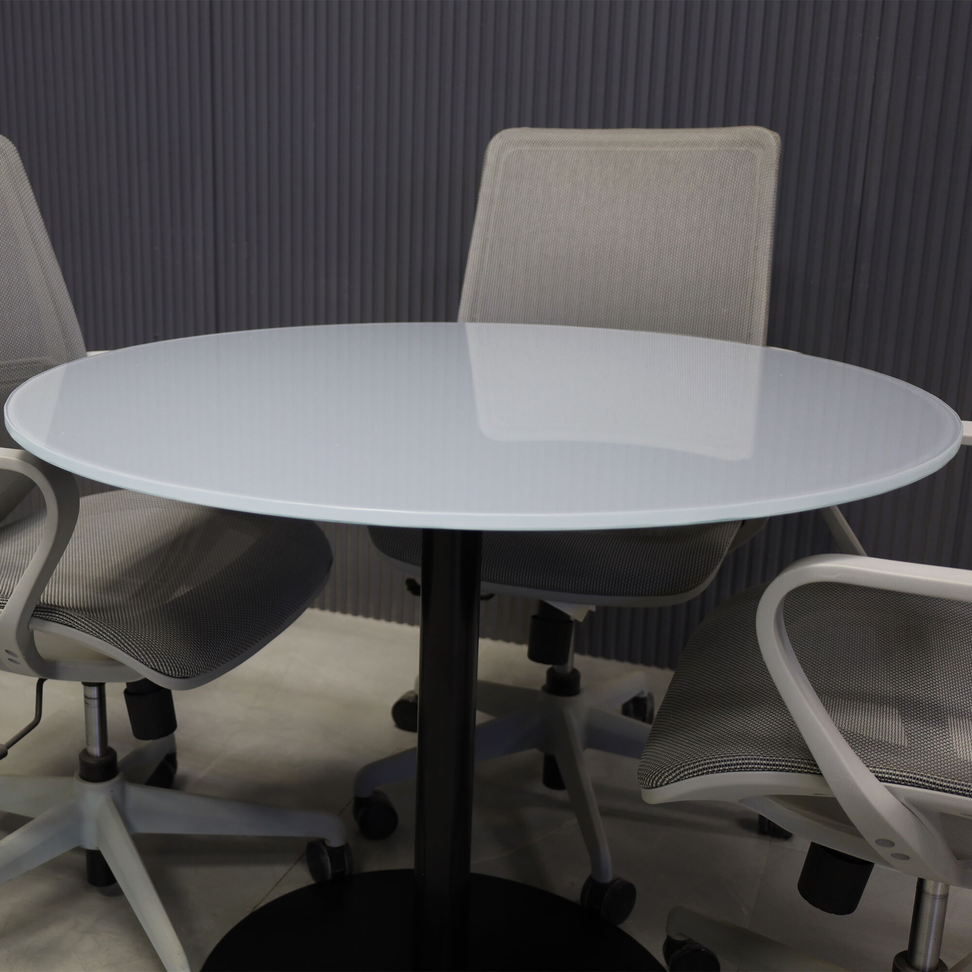 36-inch California Round Conference Table with 1/2-inch light gray tempered glass top and black metal powder-coated base.