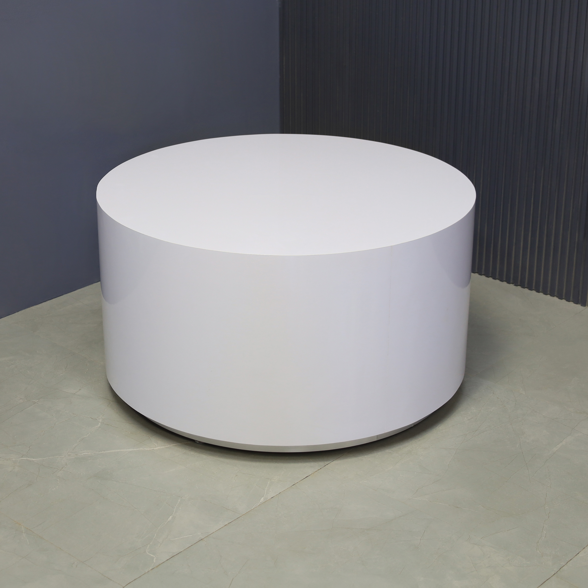 36-inch Norfolk Round Lobby Table in white matte laminate table and brushed aluminum laminate toe-kick, shown here.