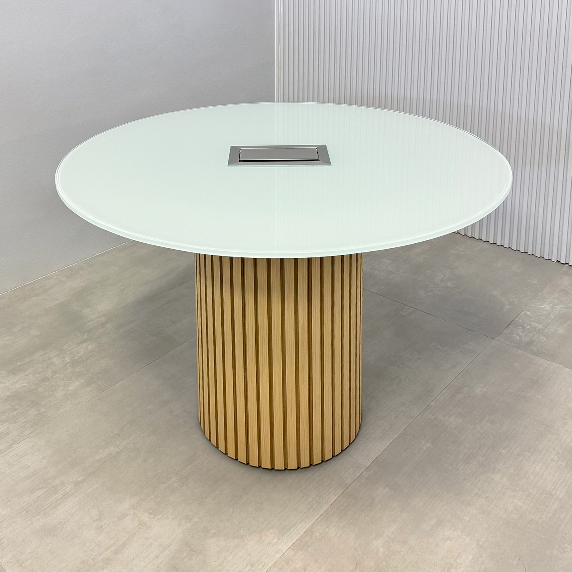 36-inch Omaha Round Conference Table with white tempered glass top, maple tambour base, and MX3 power box in silver.