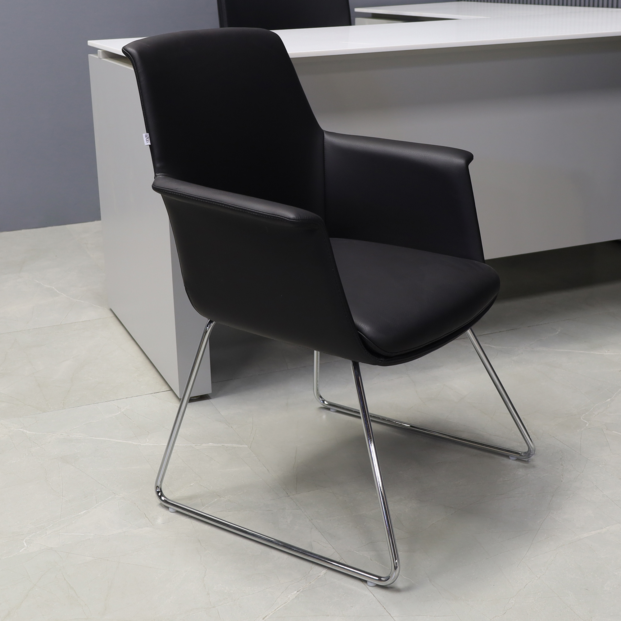 Archi Guest Chair in black upholstery, shown here.