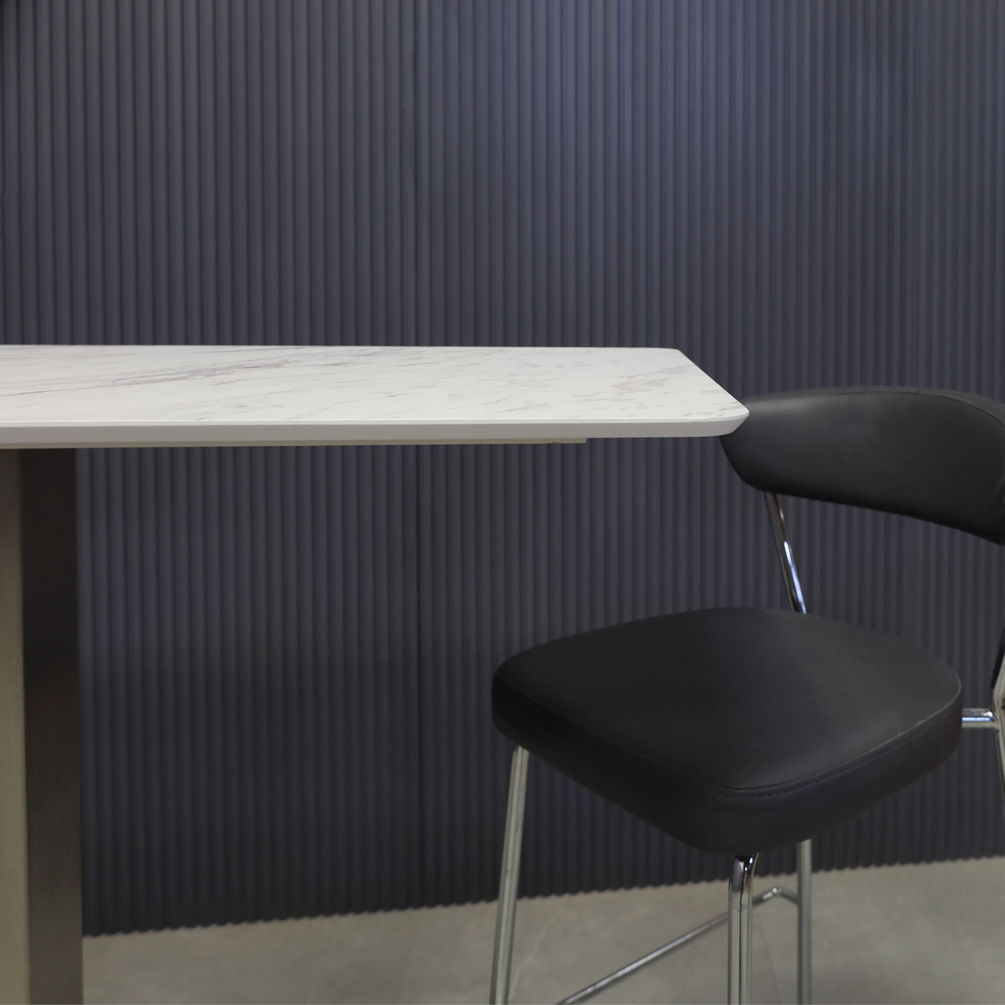 41-inch California Rectangular Bar Table in 1/2-inch calcutta blanc engineered surface top and brushed stainless steel base.