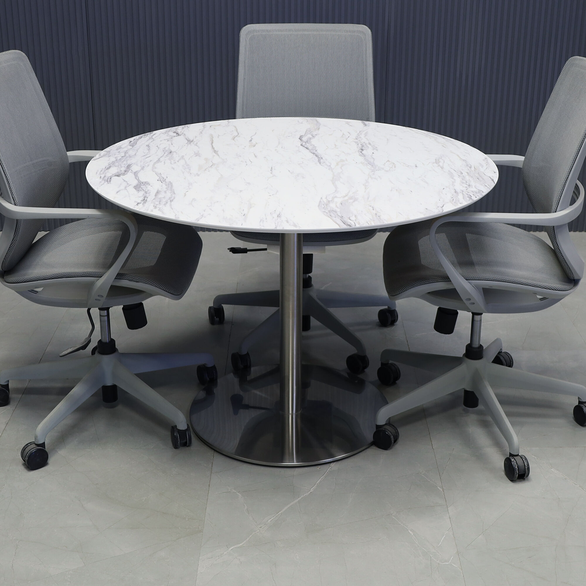42-inch California Round Conference Table with 1/2-inch calcutta blanc engineered surface top and silver metal powder-coated base.