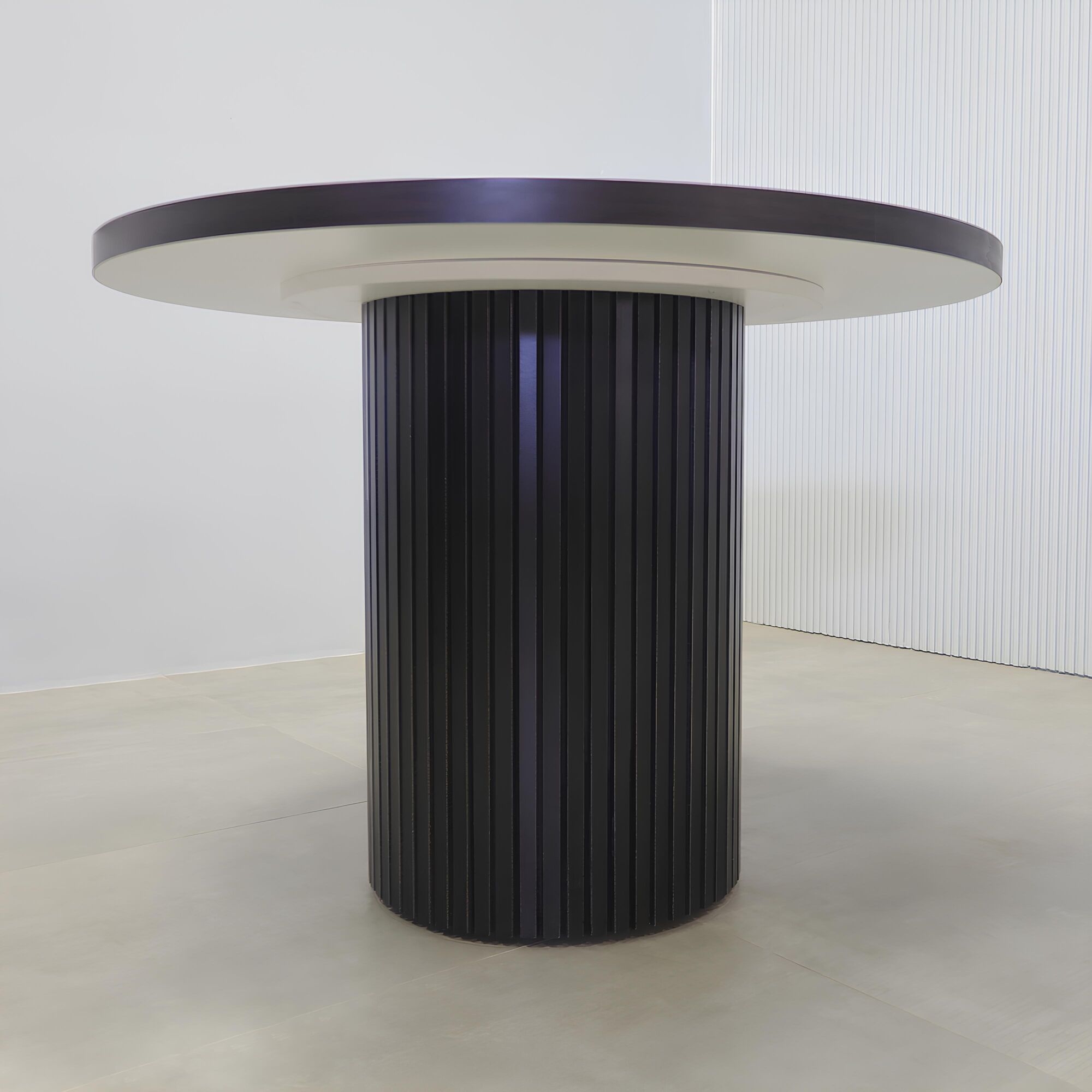 42-inch Newton Round Conference Table with X2 with ebony recon matte laminate top, black aluminum toe-kick, and Mx2 in black.