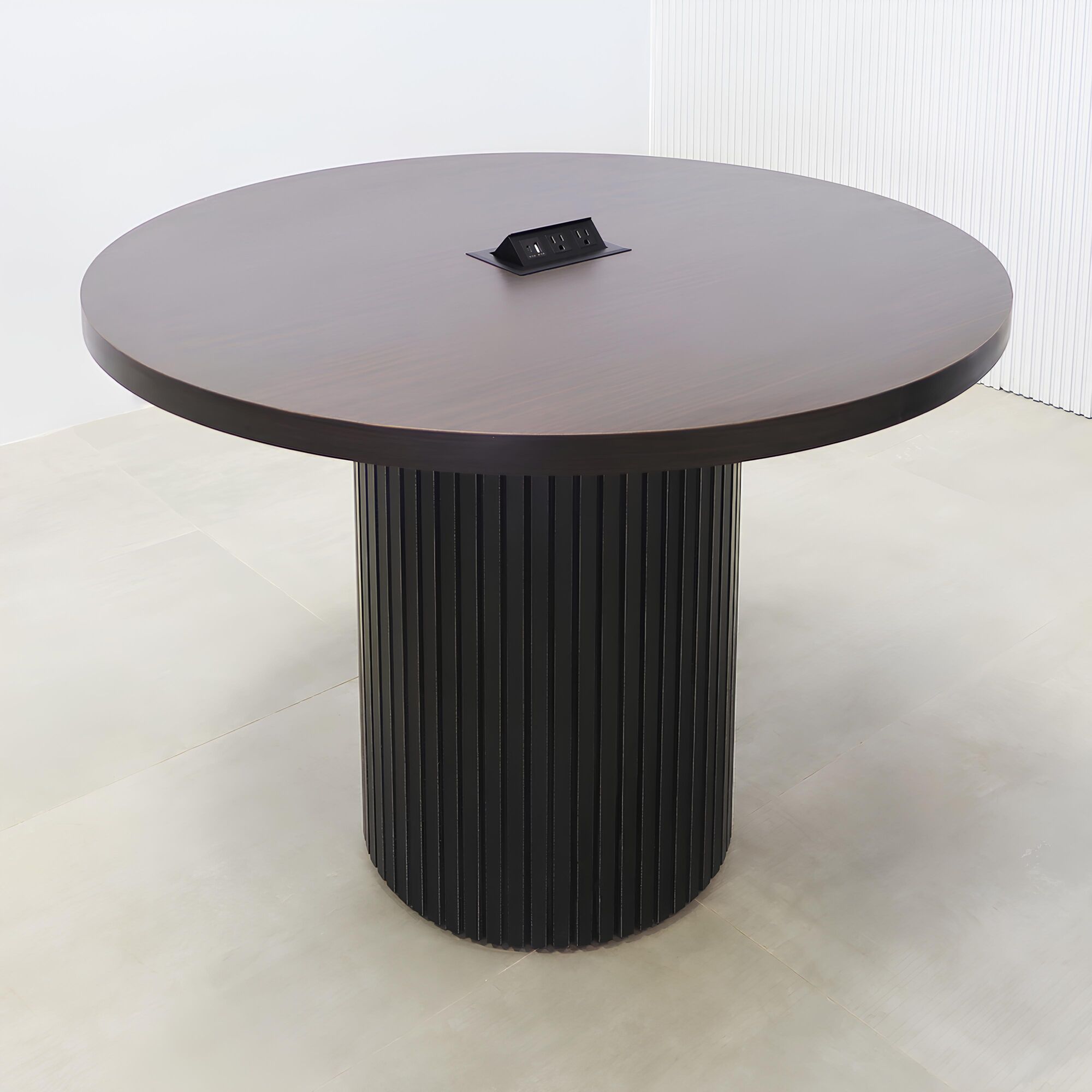 42-inch Newton Round Conference Table with X2 with ebony recon matte laminate top, black aluminum toe-kick, and Mx2 in black.