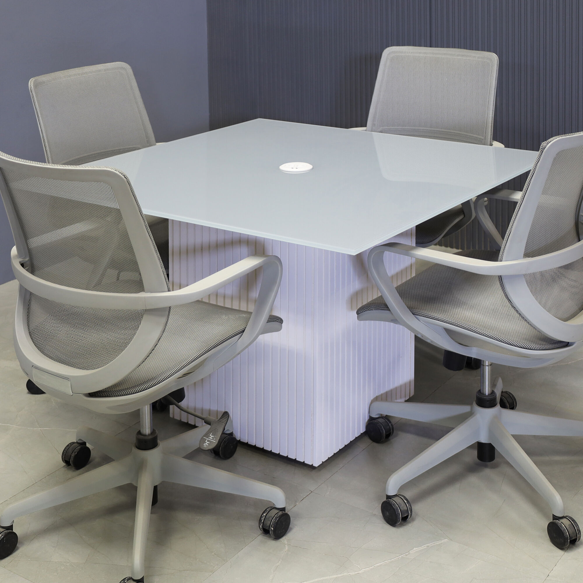 42-inch Omaha Square Conference Table in 1/2-inch light gray tempered glass top and white gloss tambour base, with white MX1 power box.