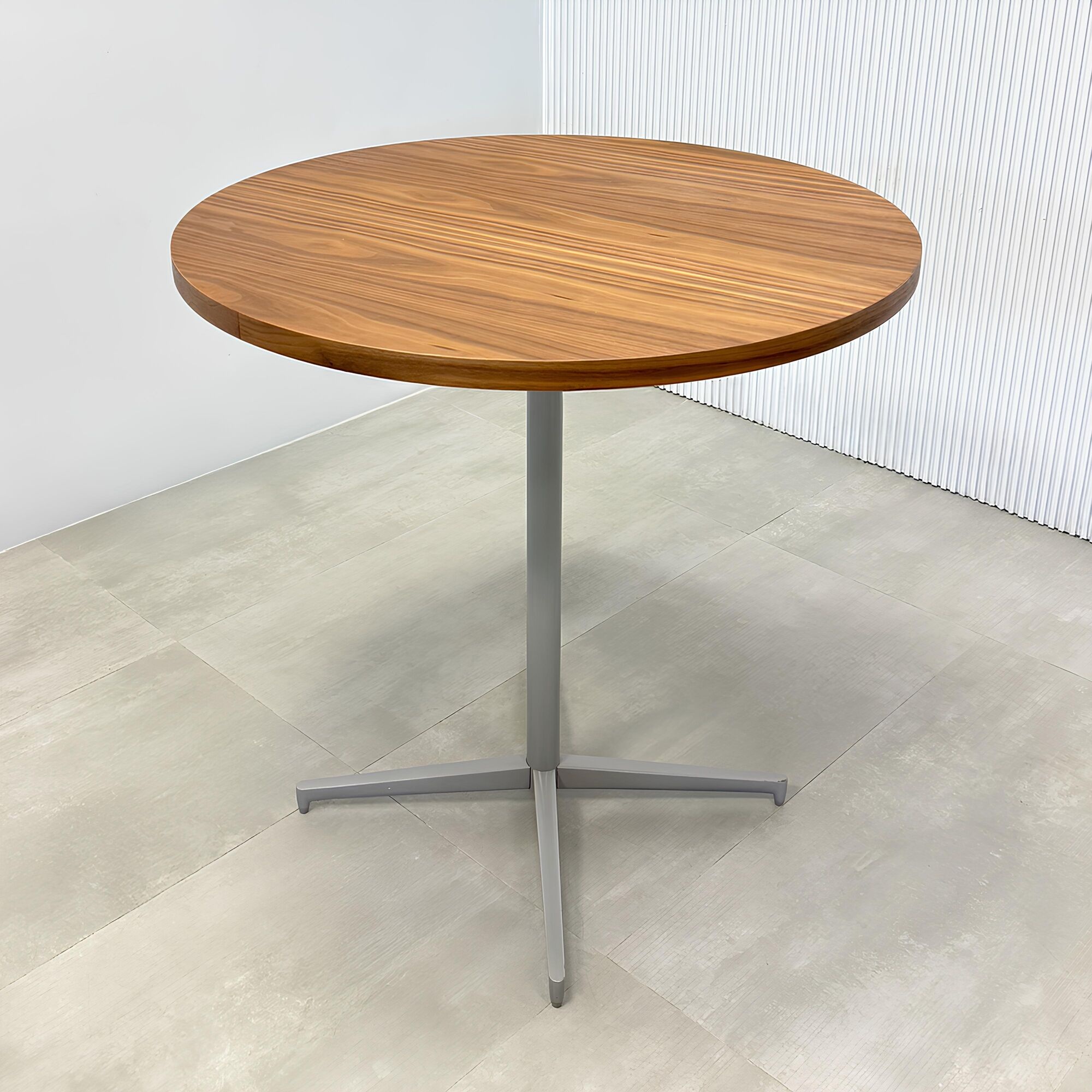 42-inch Newton Round Conference Table with Star Base in walnut veneer top, and star base in silver powder coated.