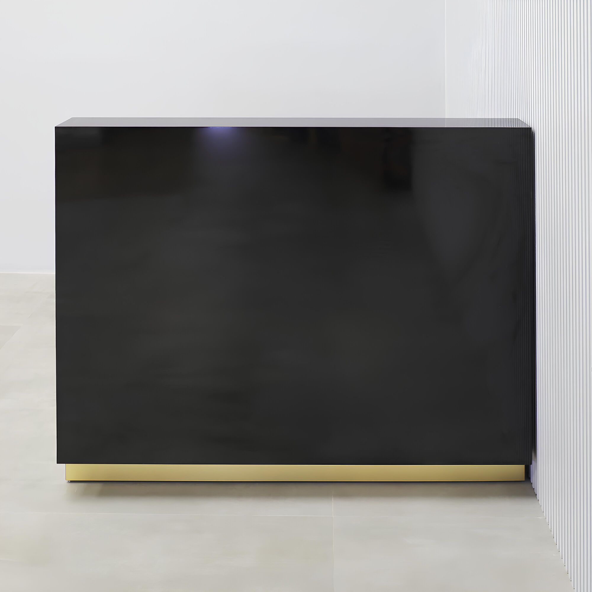 48-inch Dallas Straight Reception Desk with black gloss laminate front & workspace, and gold aluminum toe-kick.