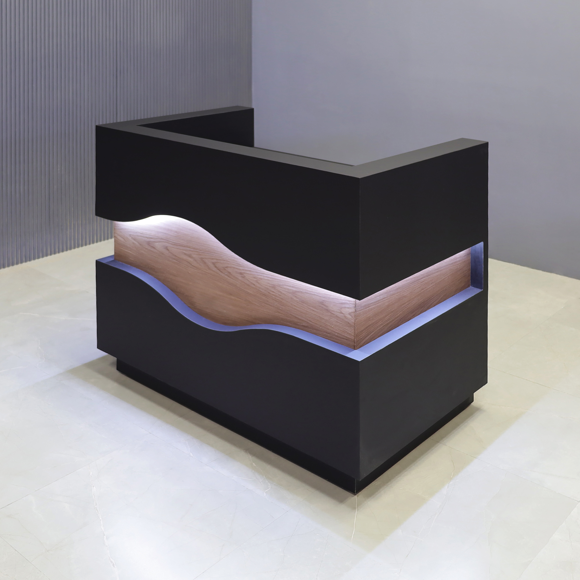 48-inch Wave Podium & Host in black traceless laminate main desk & toe-kick, and walnut veneer wave accent, with warm-white LED, shown here.