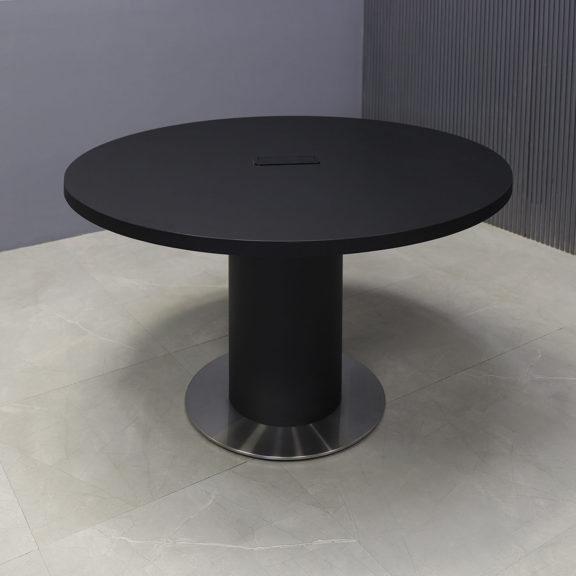 48-inch Newton Round  With Laminate Top With Laminate Top & pedestal in black traceless laminate, silver metal powder-coated base, and black power box.