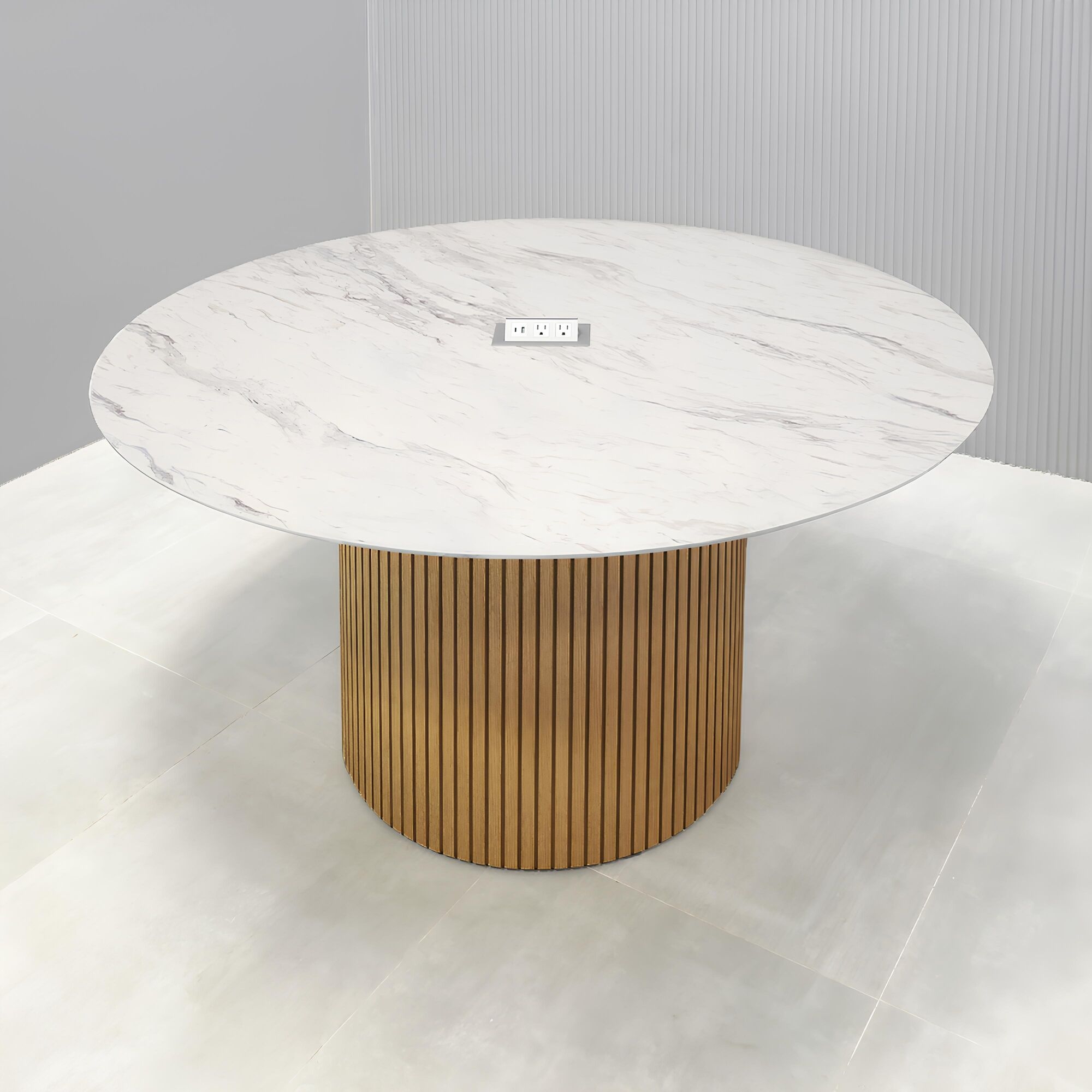 48-inch Aurora Round Conference Table in 1/2-inch calcutta blanc engineered surface top, white oak tambour base, and silver MX3 power box.