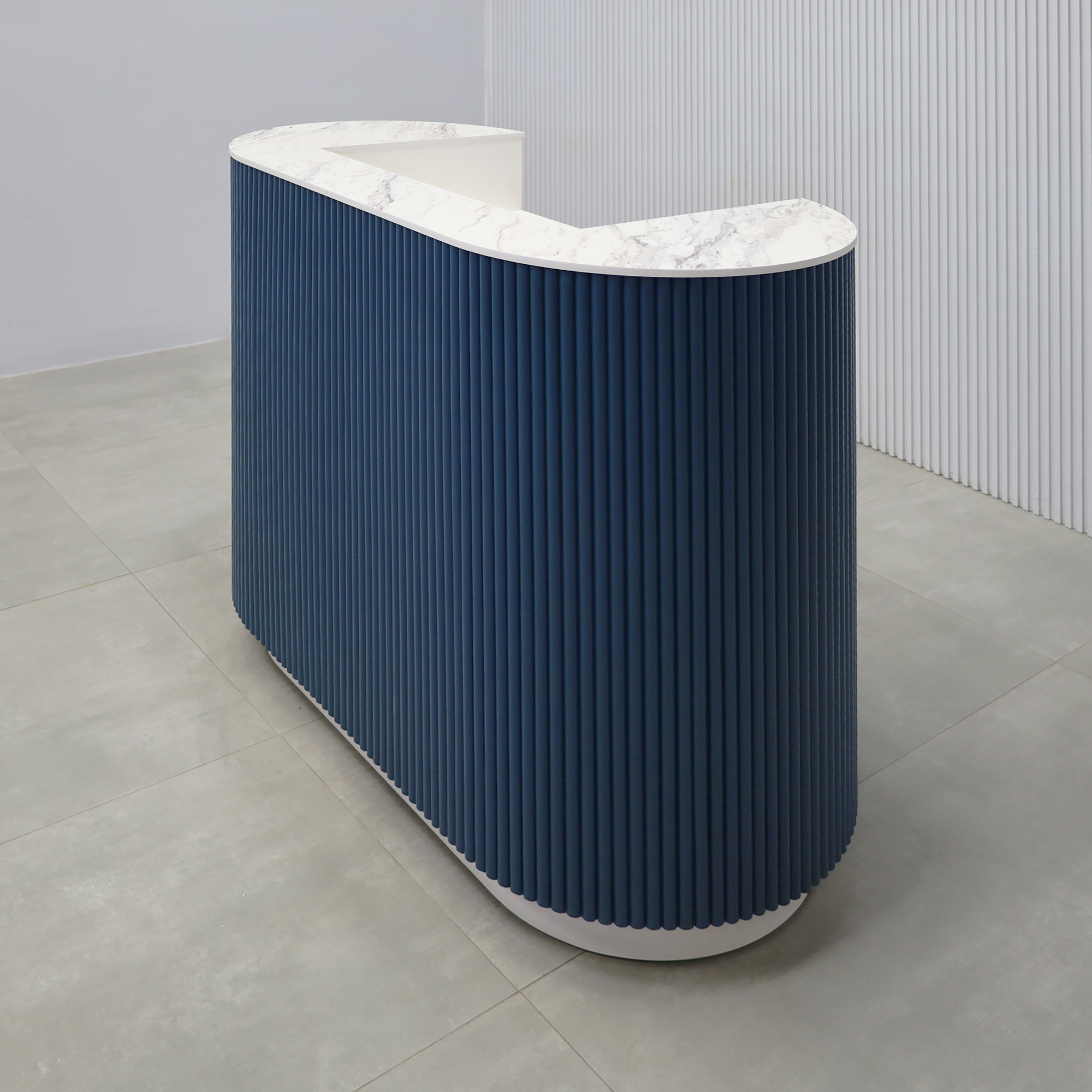 48-inch The Pill X2 Podium & Host Custom Desk with Dover Off-White matte laminate desk, and Sapphire CSP Benjamin Moore (Special Solid Wood Tambour Color). Calcutta Blanc engineered surface top, and Dover Off-White matte laminate toe-kick.