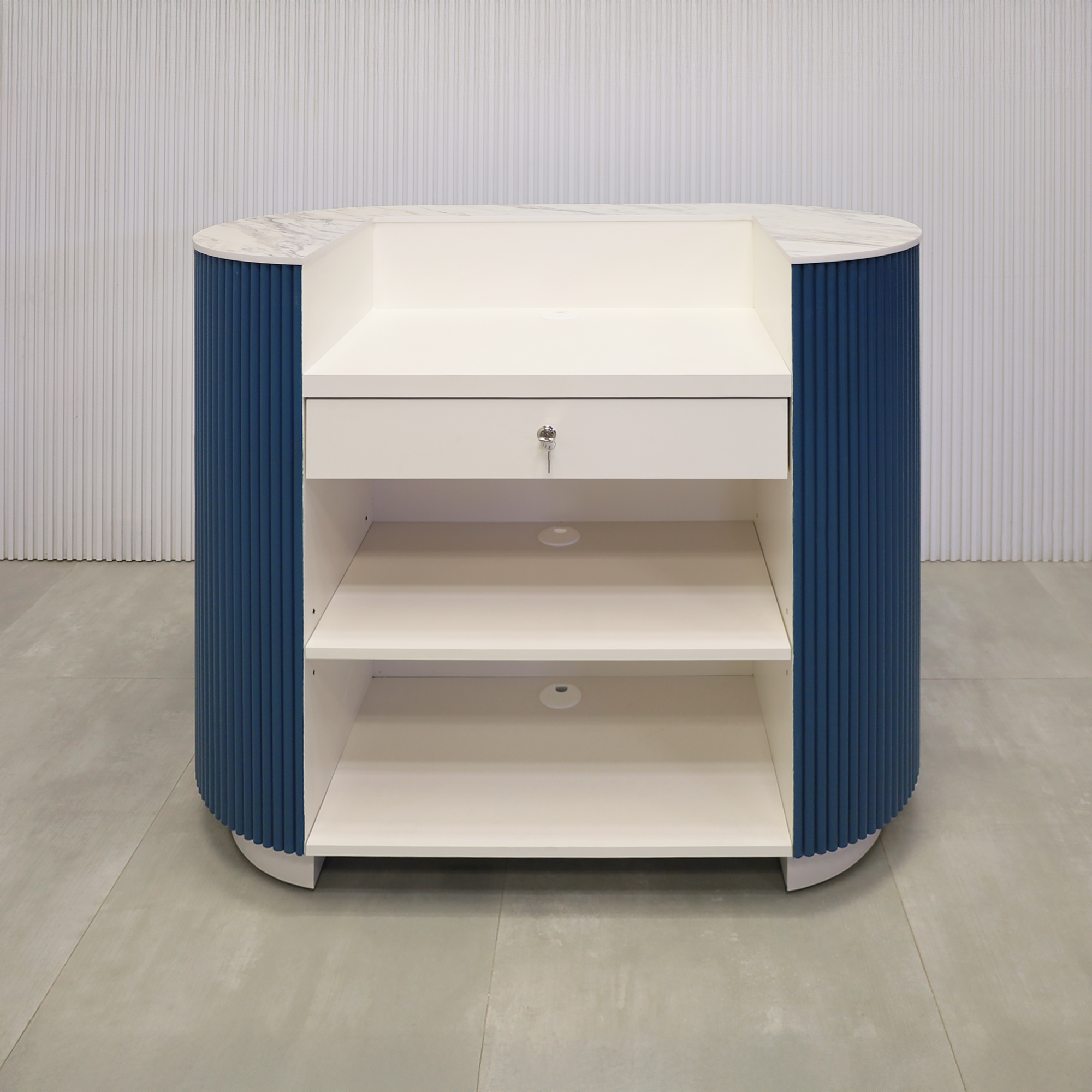 48-inch The Pill X2 Podium & Host Custom Desk with Dover Off-White matte laminate desk, and Sapphire CSP Benjamin Moore (Special Solid Wood Tambour Color). Calcutta Blanc engineered surface top, and Dover Off-White matte laminate toe-kick.