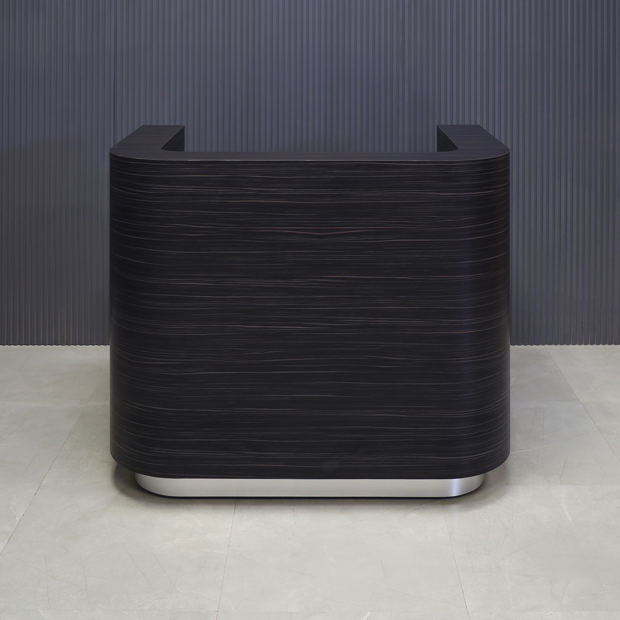 48-inch Nola Reception Desk in madagascar matte laminate main desk and brushed aluminum toe-kick, with color LED shown here.