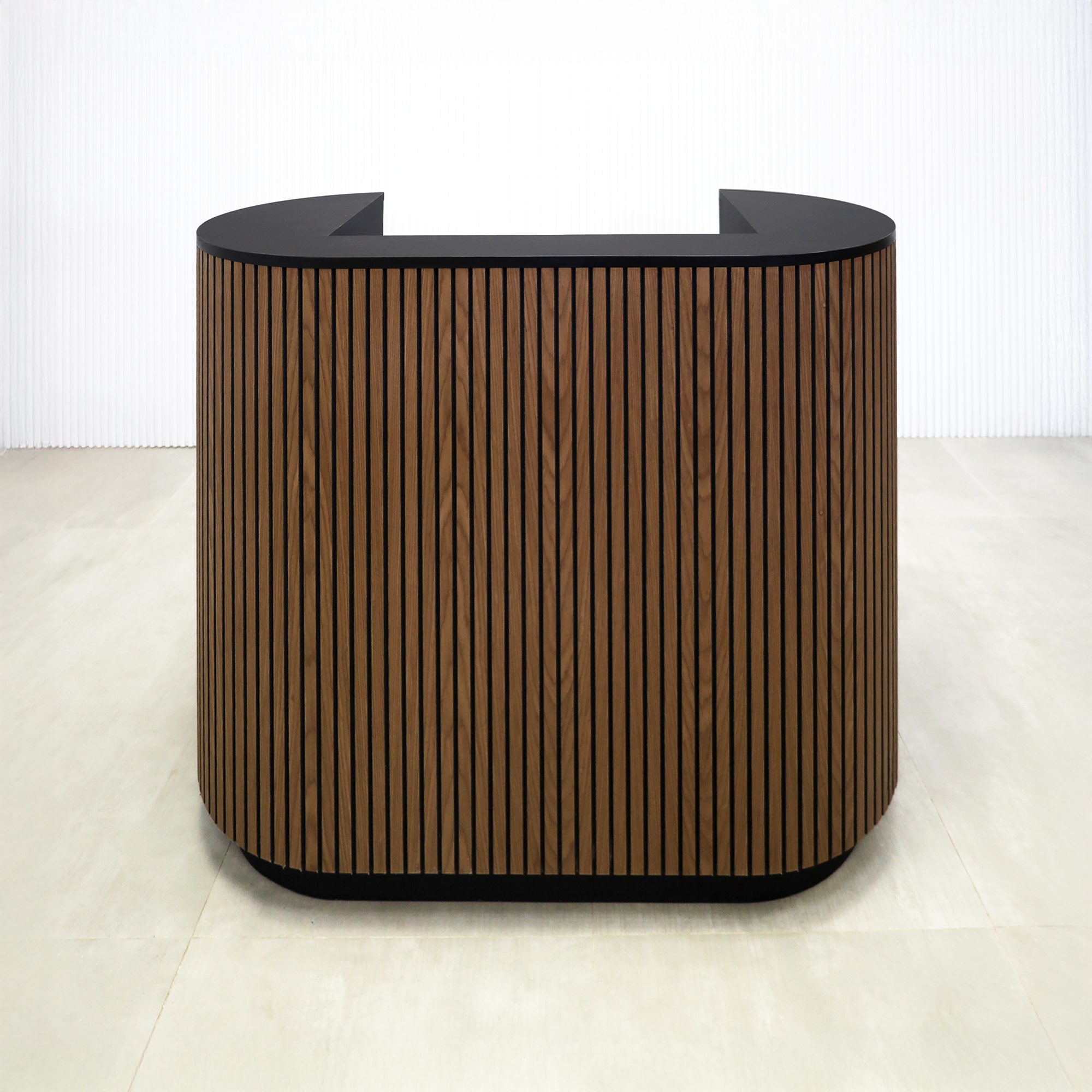 48-inch The Pill Podium & Host Custom Desk with walnut tambour & black background main body, black traceless laminate workspace and top, and black traceless laminate toe-kick.