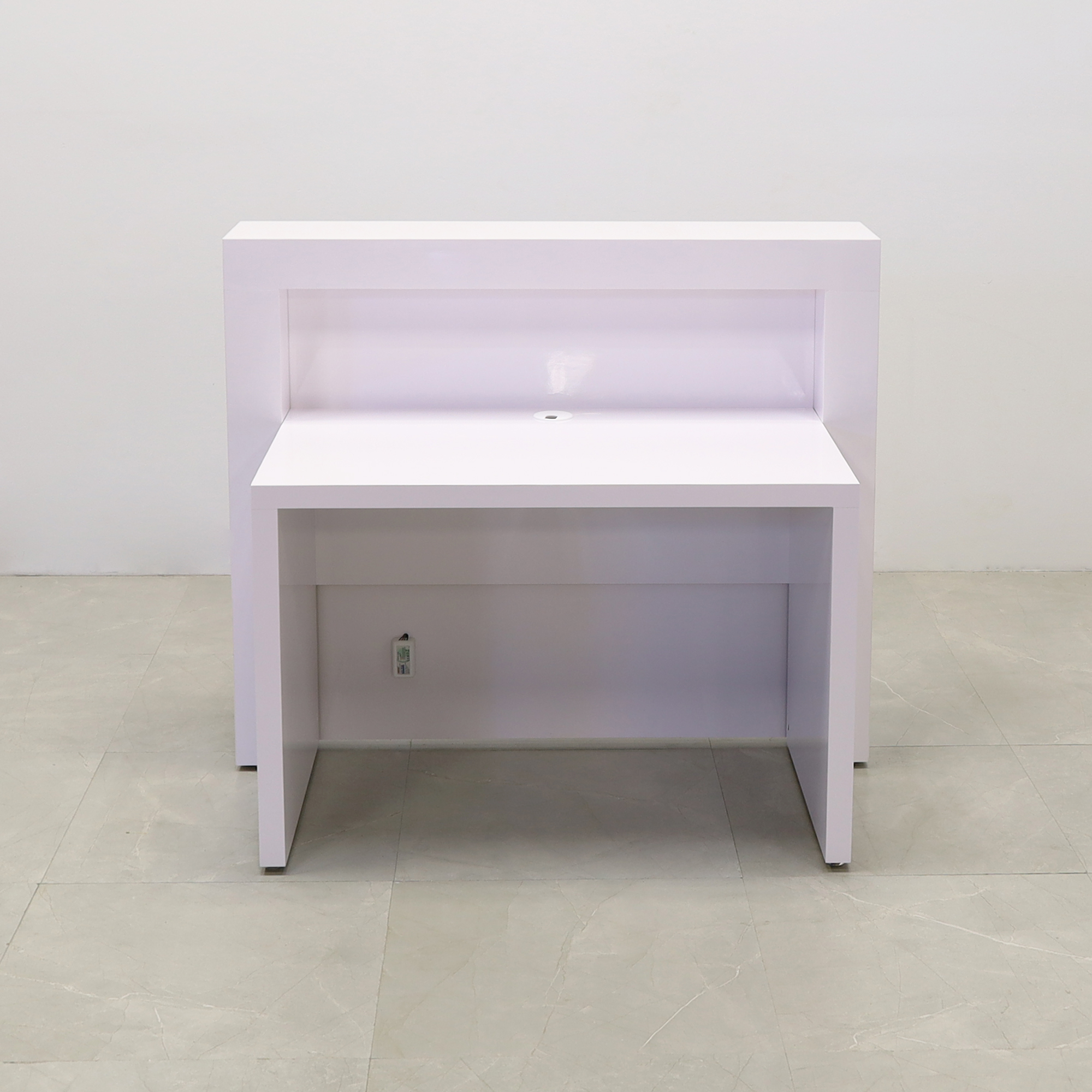 48-inch New York Straight Reception Desk in white gloss laminate finish, with multi-colored LED, shown here.
