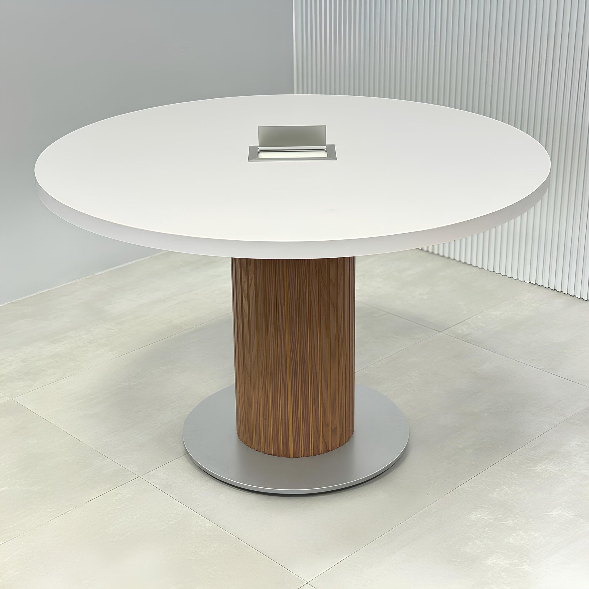 48-inch Newton Round Conference Table with X3 Base with white matte laminate top, walnut tambour with natural background, and silver powder-coated base.