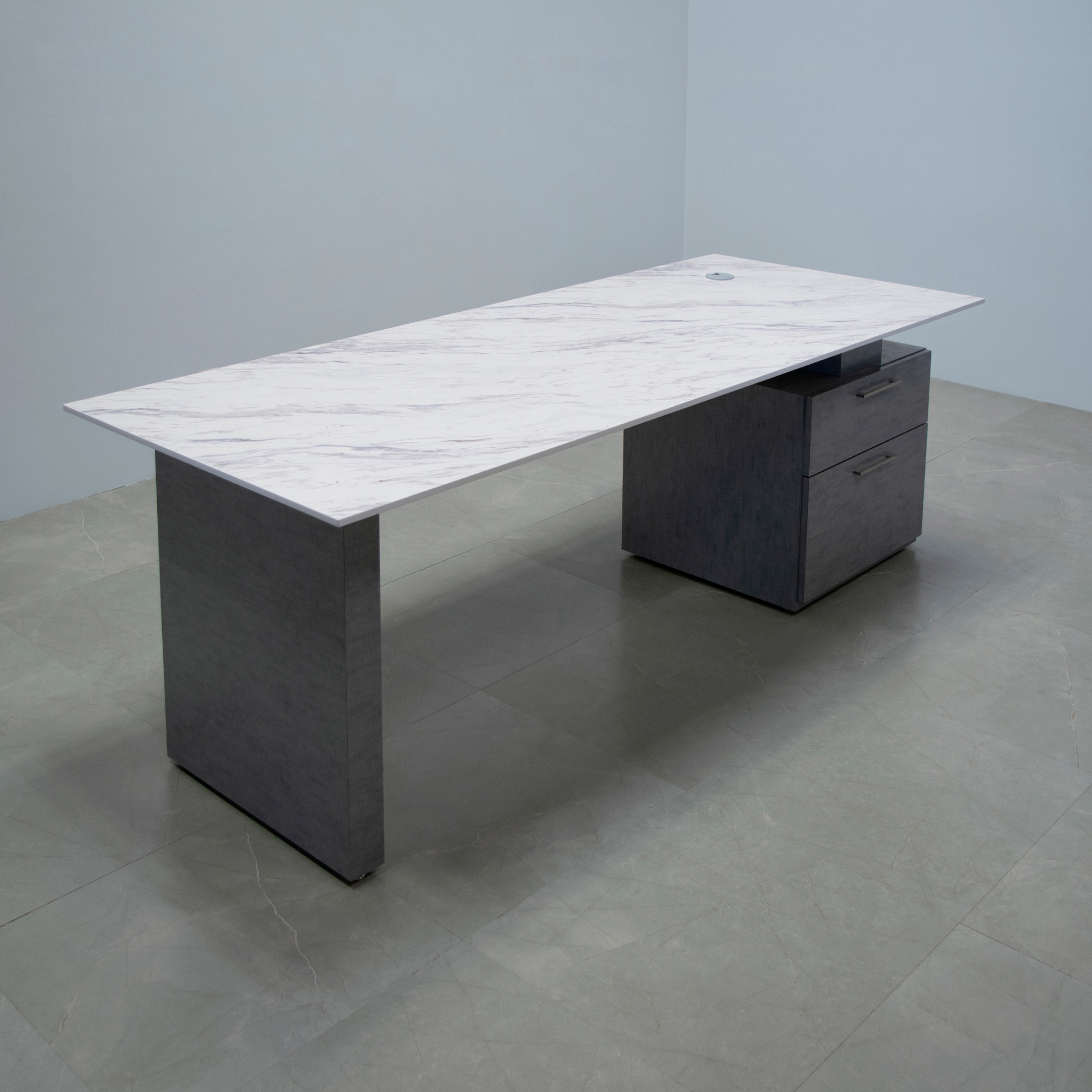 Avenue Straight Executive Desk With Engineered Surface Top, right side storage when sitting in calcutta blanc top and silver alchemy laminate base and storage shown here.