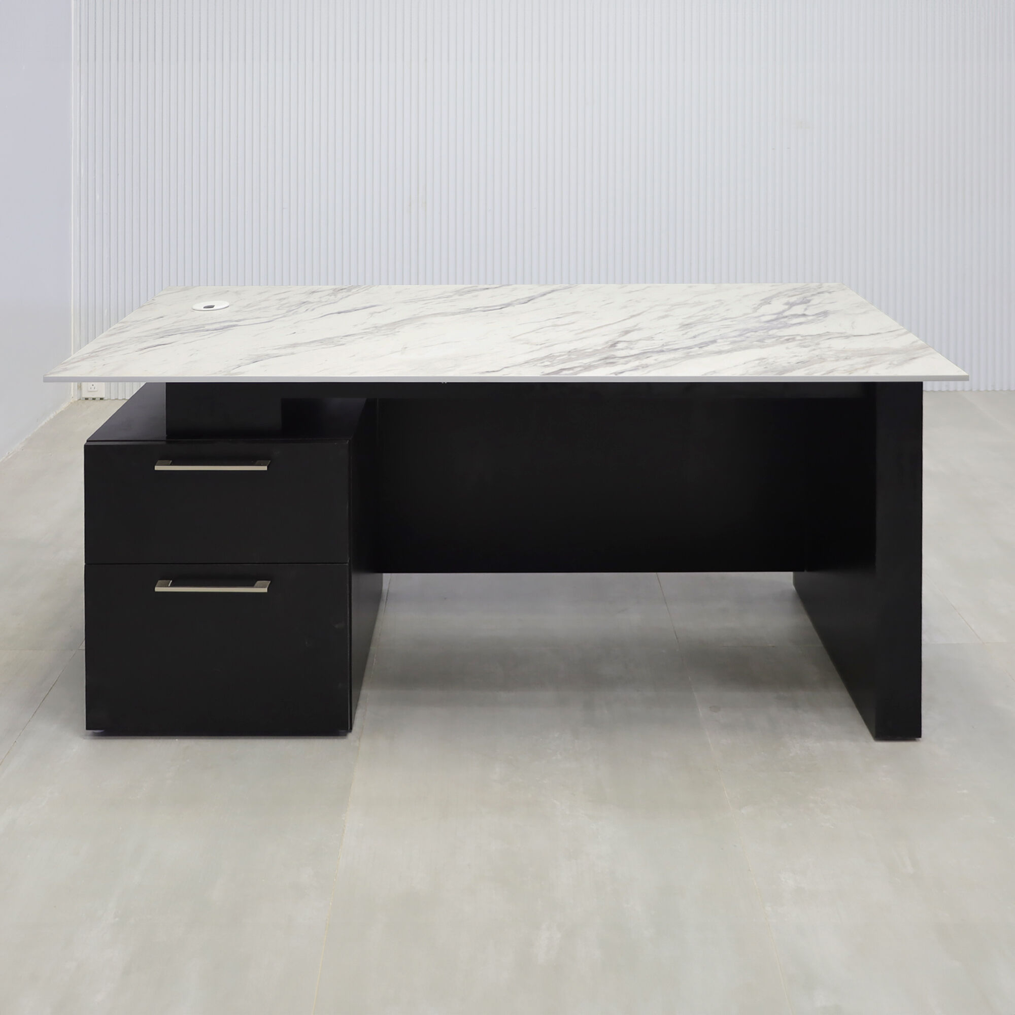 59.5-inch Avenue Straight Executive Desk with calcutta blanc engineered surface top, black matte laminate base & cabinet, and black matte laminate privacy panel.