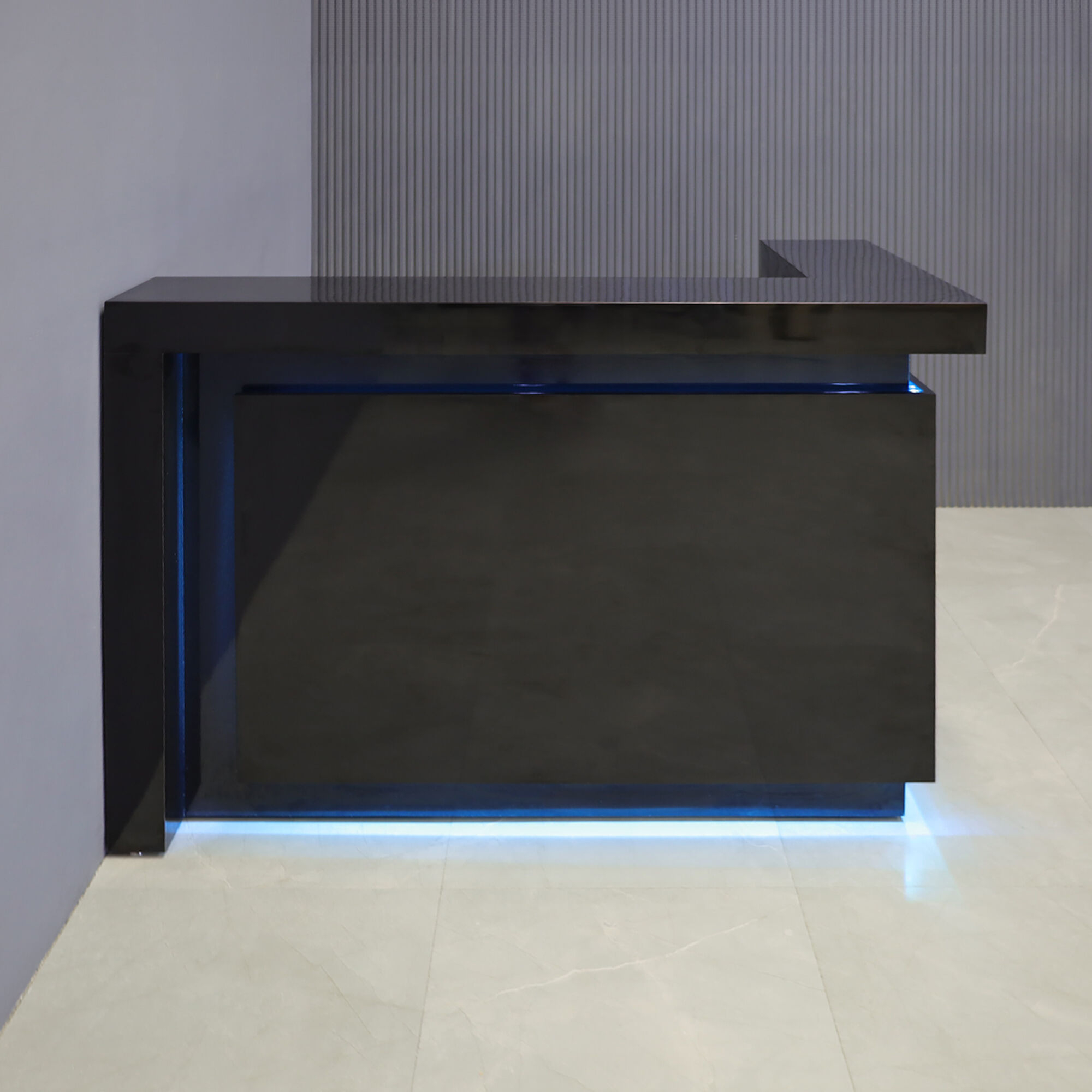 60-inch New York L-Shape Reception Desk in black gloss laminate main desk, front panel and accent recess, on the right side when facing front, and color changing LED.