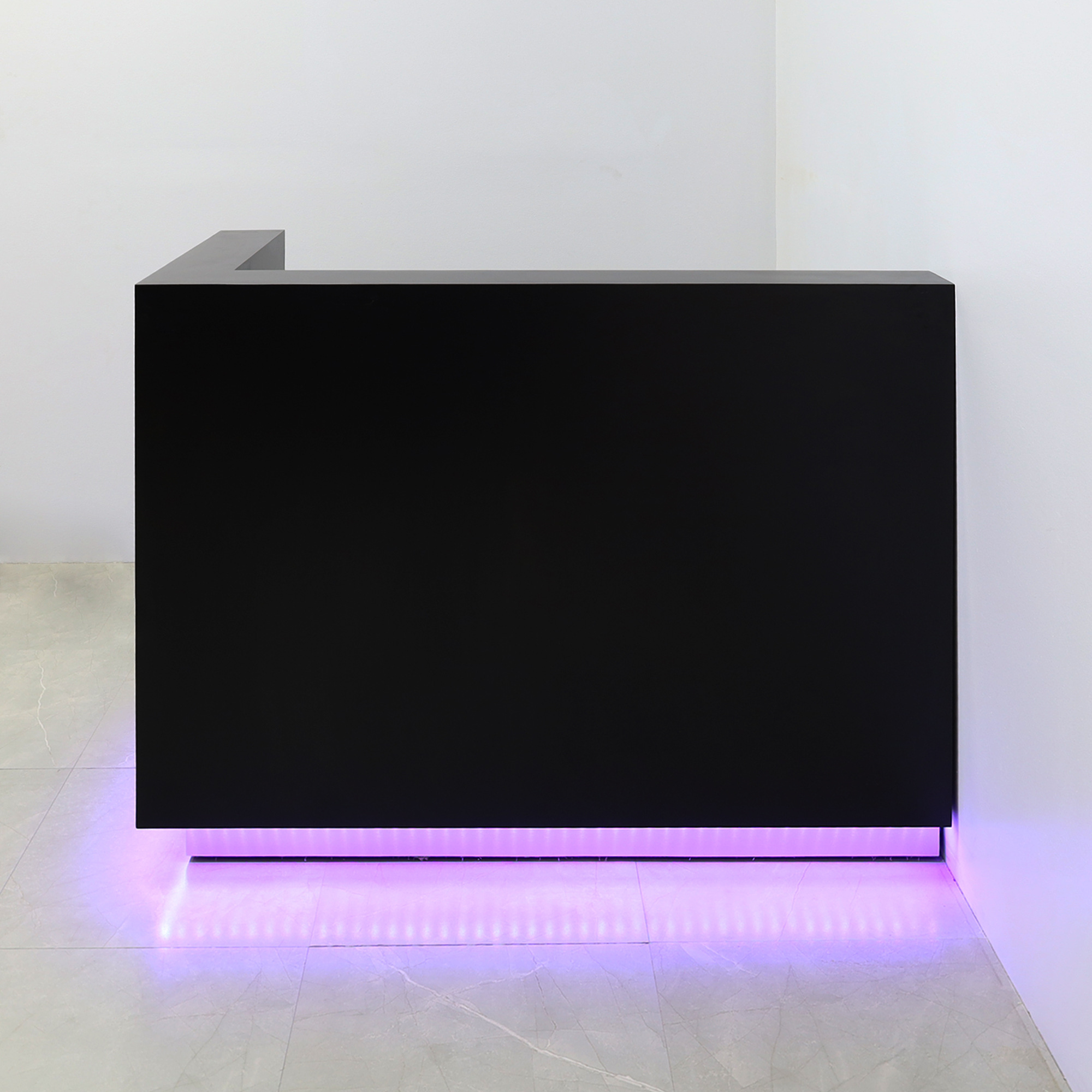 60-inch Dallas L-Shape Custom Reception Desk, left side l-panel when facing front in black matte laminate main desk and brushed aluminum toe-kick, with color LED, shown here.