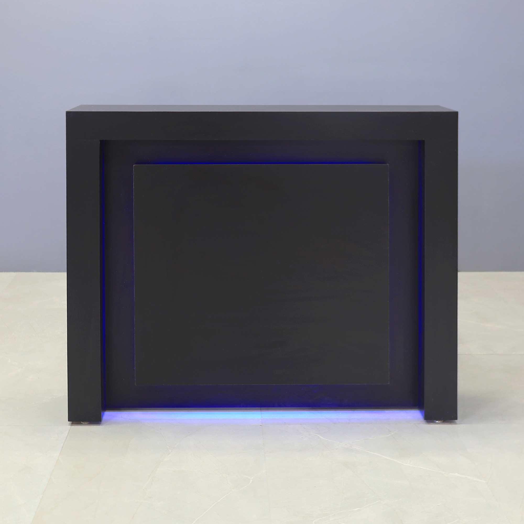 60-inch New York Straight Reception Desk in black matte laminate main desk and accent recess front panel, with colored LED, shown here.