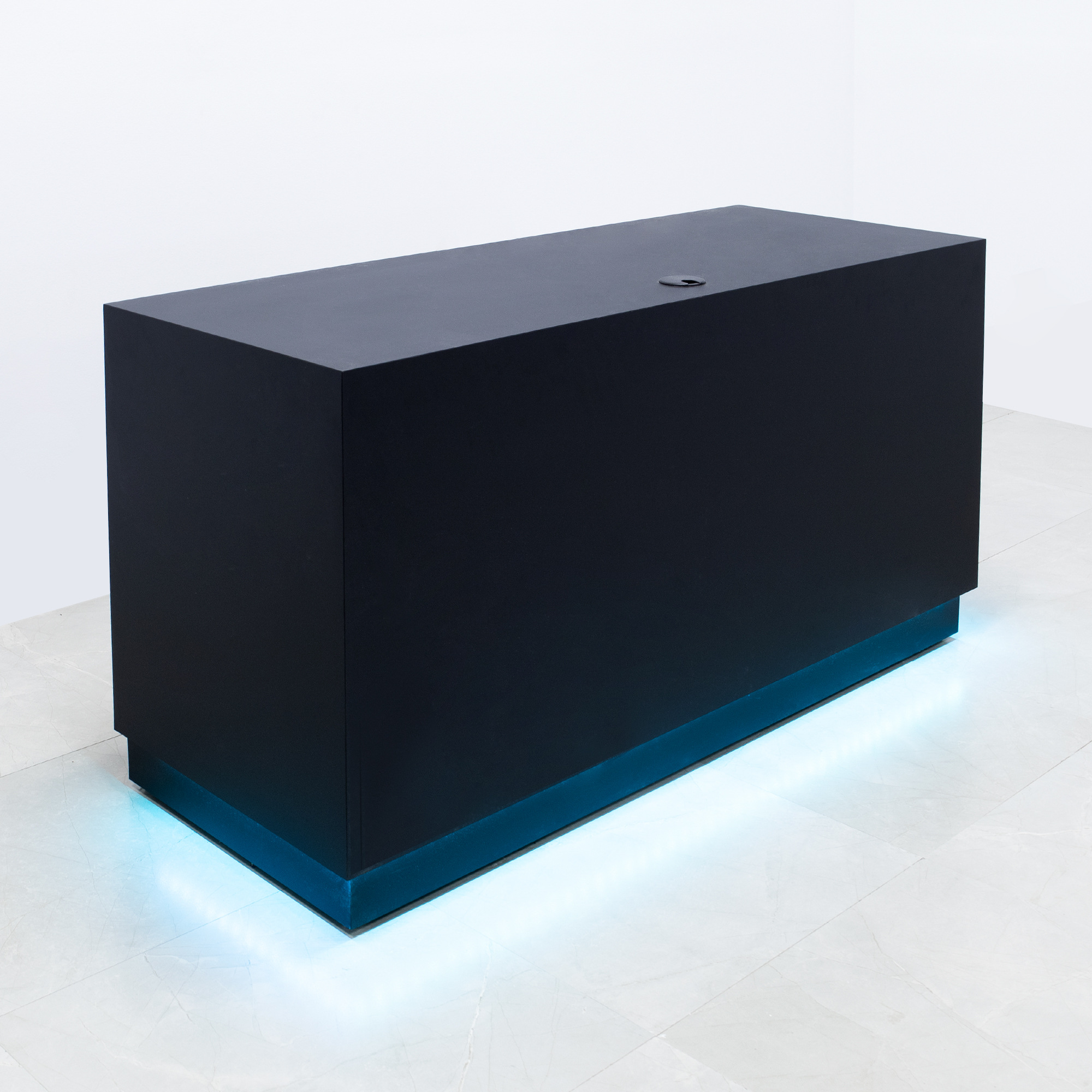 60-inch Houston Custom Reception Desk in black traceless laminate main desk and toe-kick, with white LED, shown here.