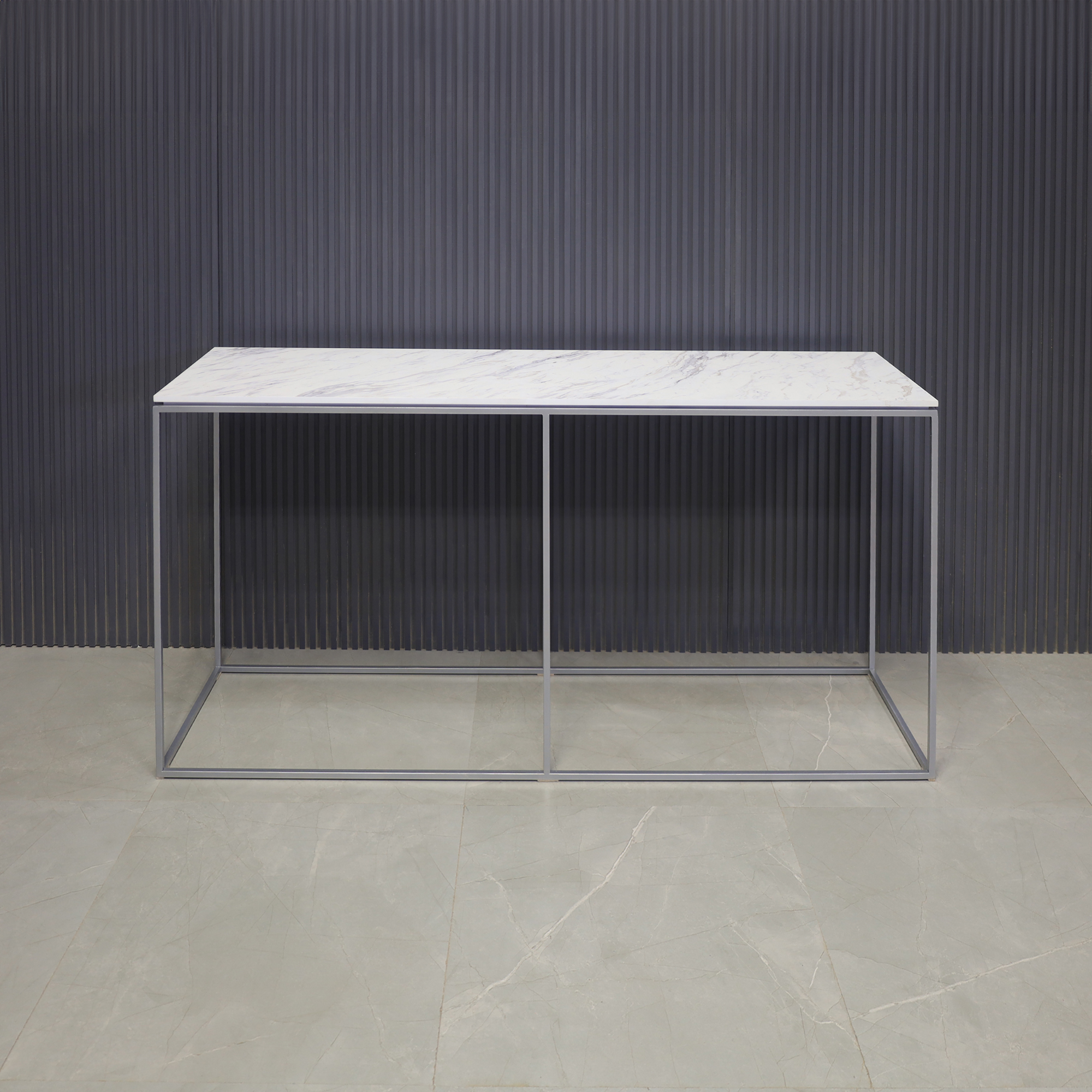 60-inch Aspen Console Table in 1/2" calcutta blanc engineered surface top and silver metal frame, shown here.