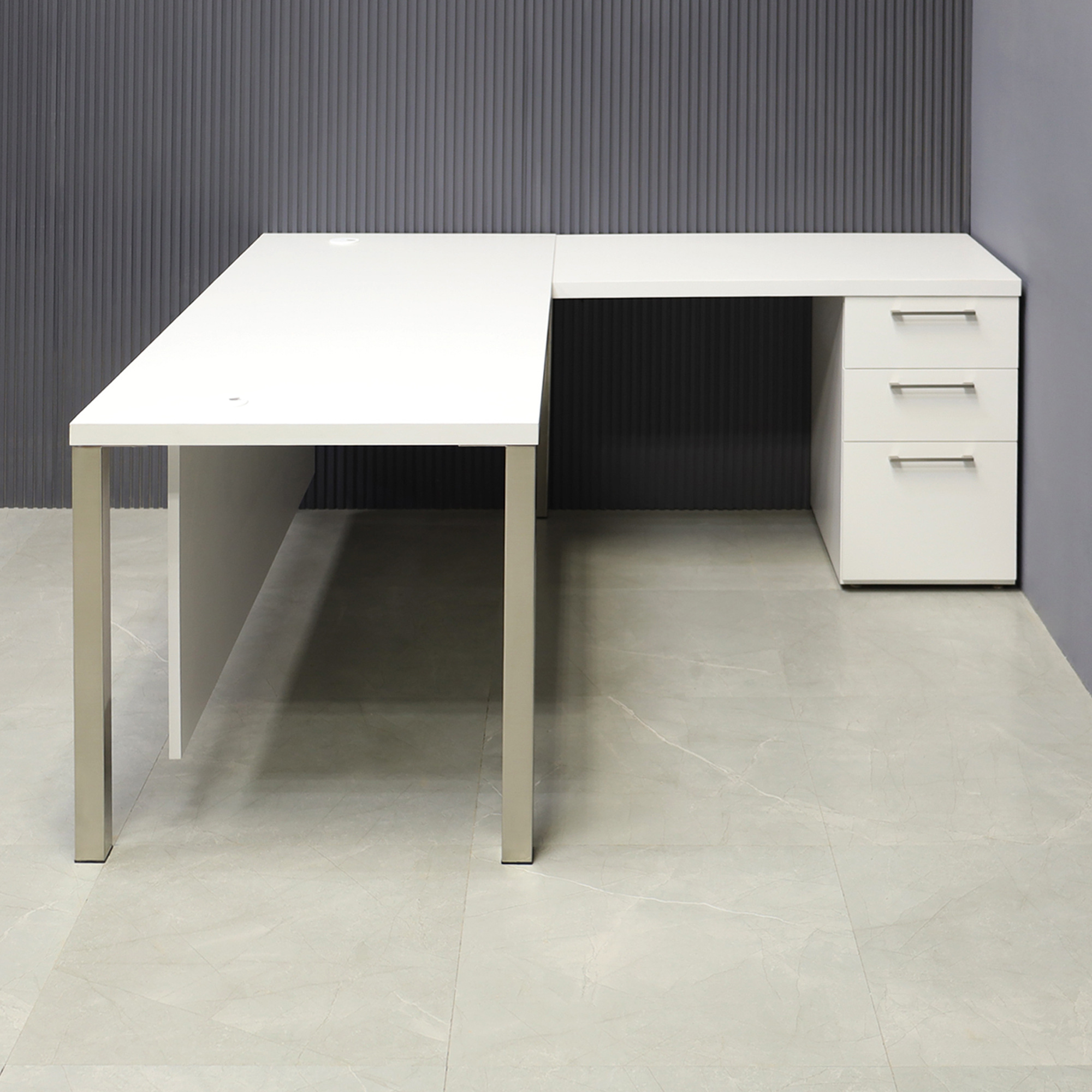 60-inch Dallas L-Shape Executive Desk, right side cabinet & return when sitting and two grommet holes on both sides in dover off-white matte laminate top, cabinet and privacy panel, with chromed legs, shown here.